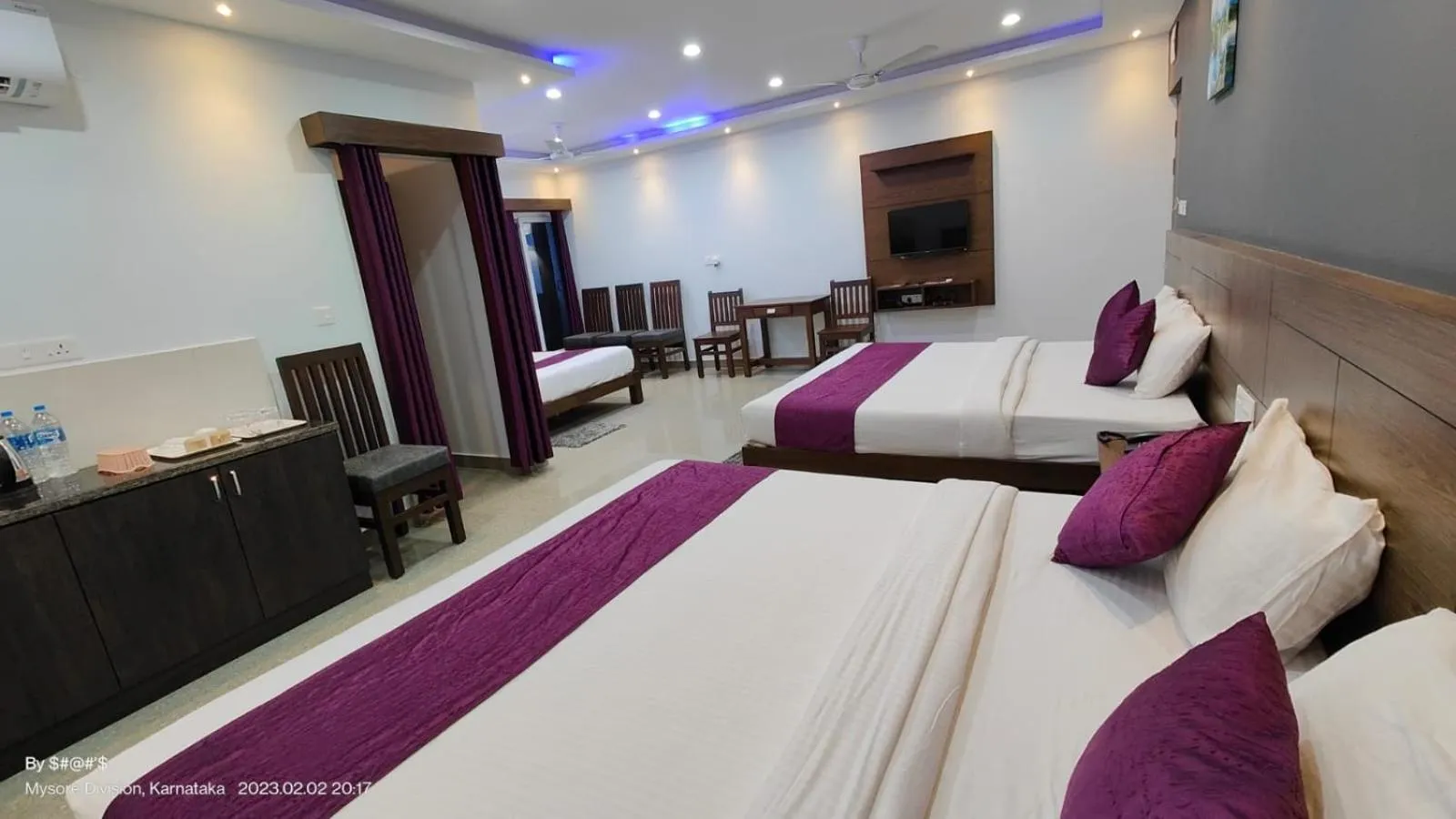 Communal lounge/ TV room, Bed in Coorg ASHOK PALACE