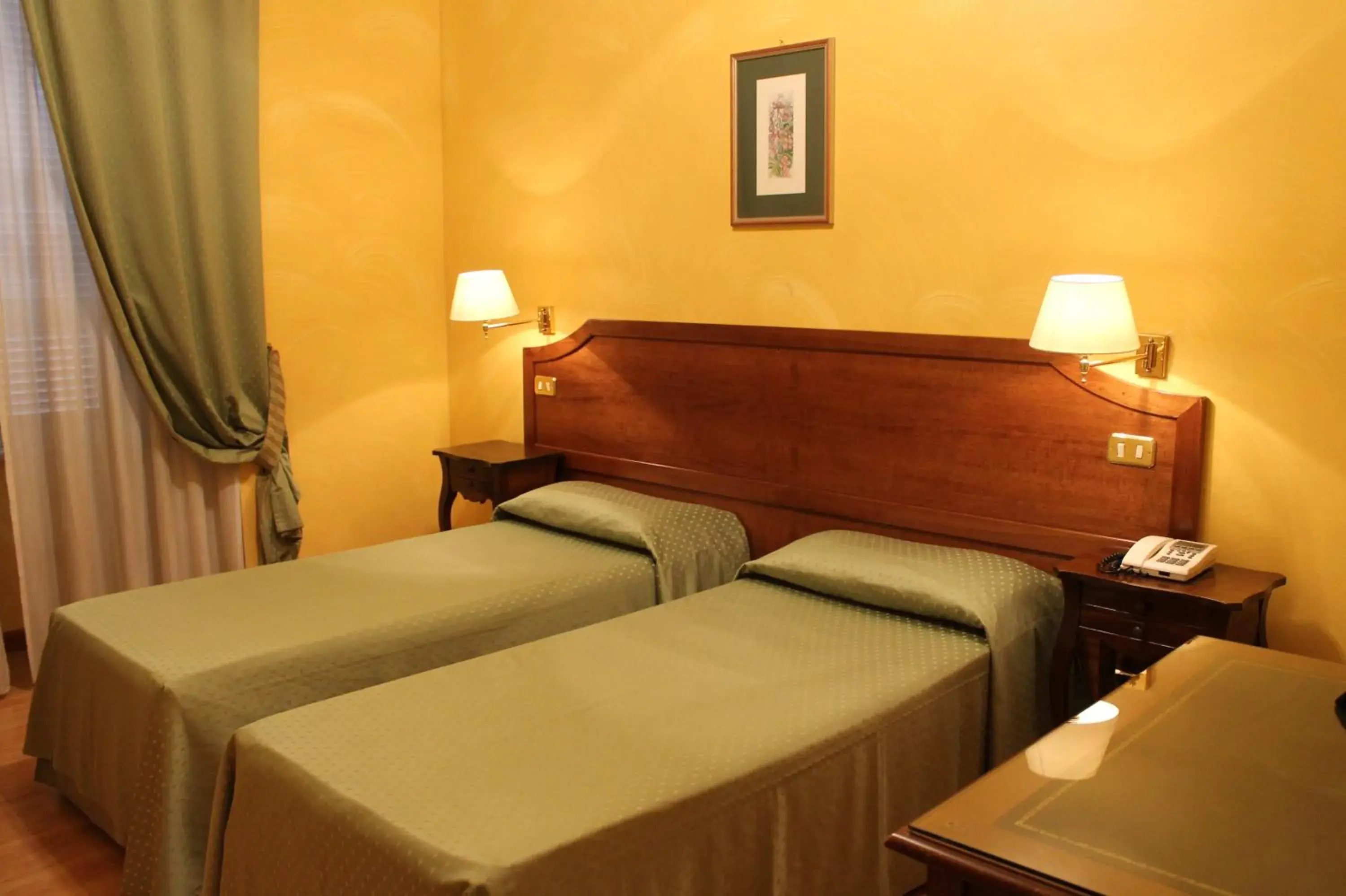 Bed in Hotel Fiori Bed in Hotel Fiori