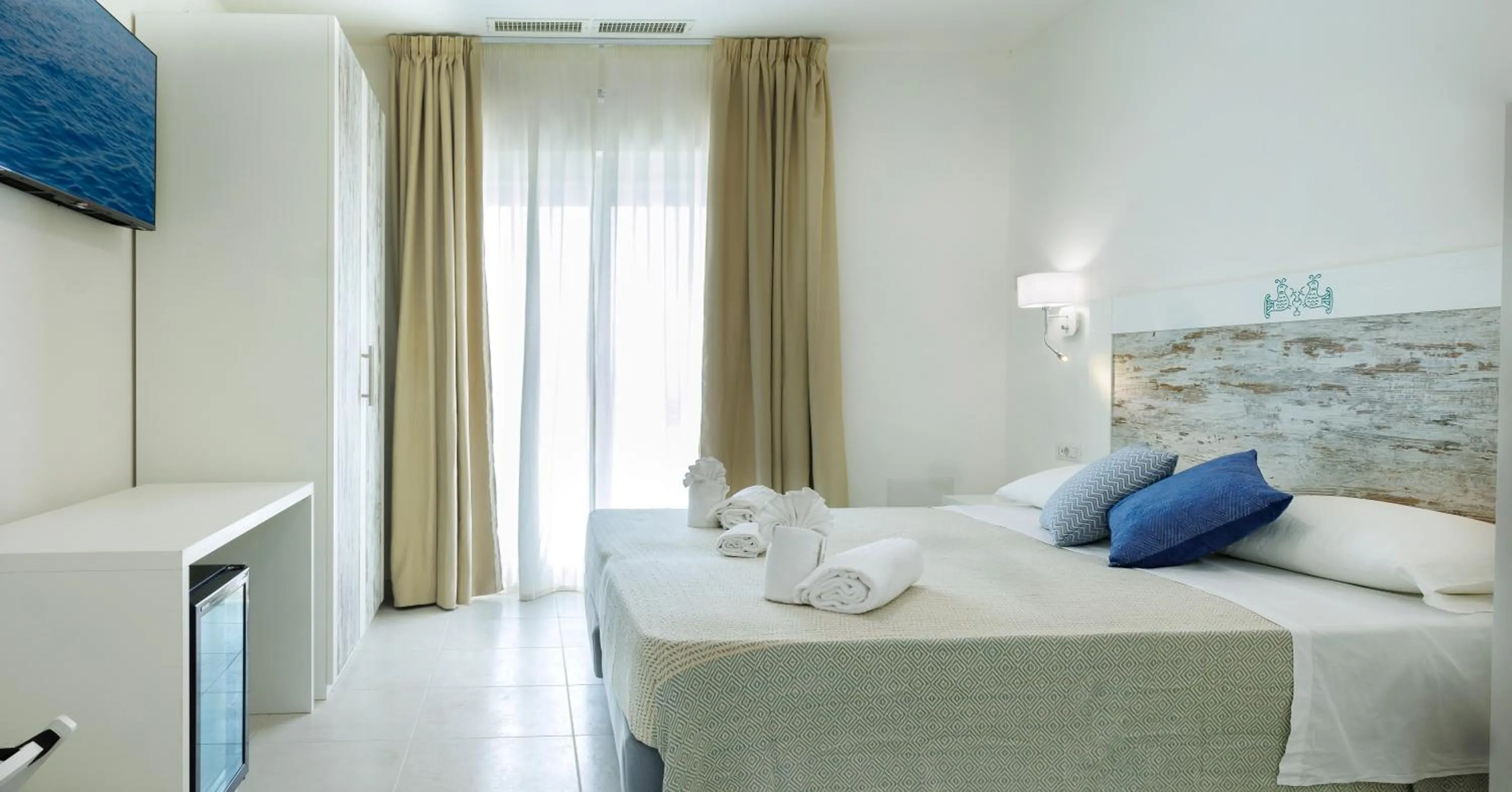 Bed in Mercury Beach Hotel