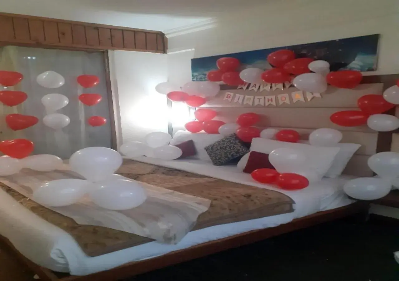 Bed in Hotel Aroma Nainital In house parking Bed in Hotel Aroma Nainital In house parking