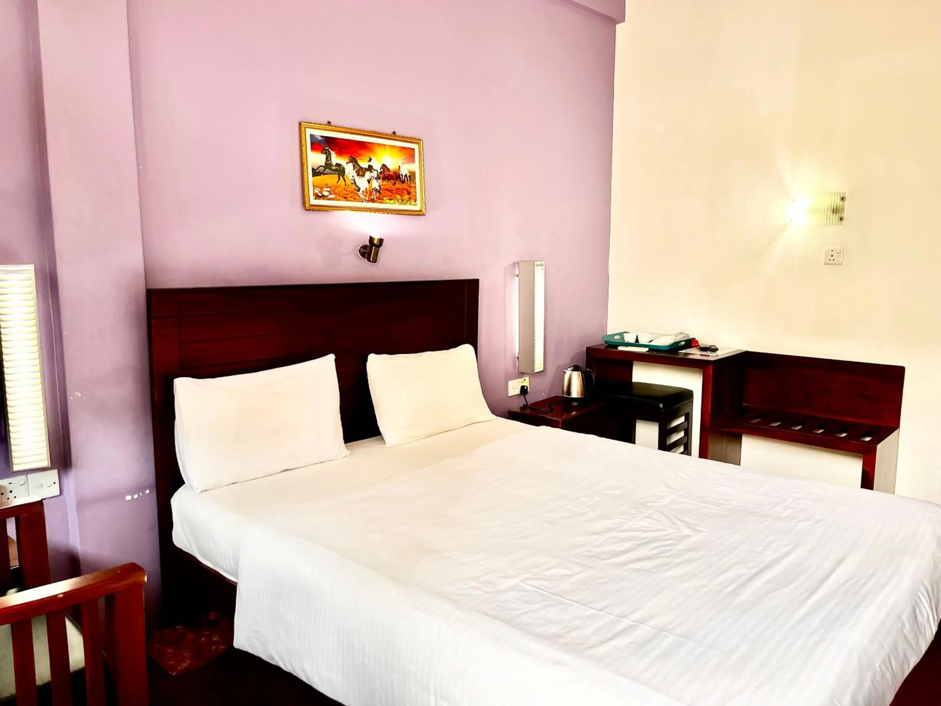 Bed in Subhas Tourist Hotel