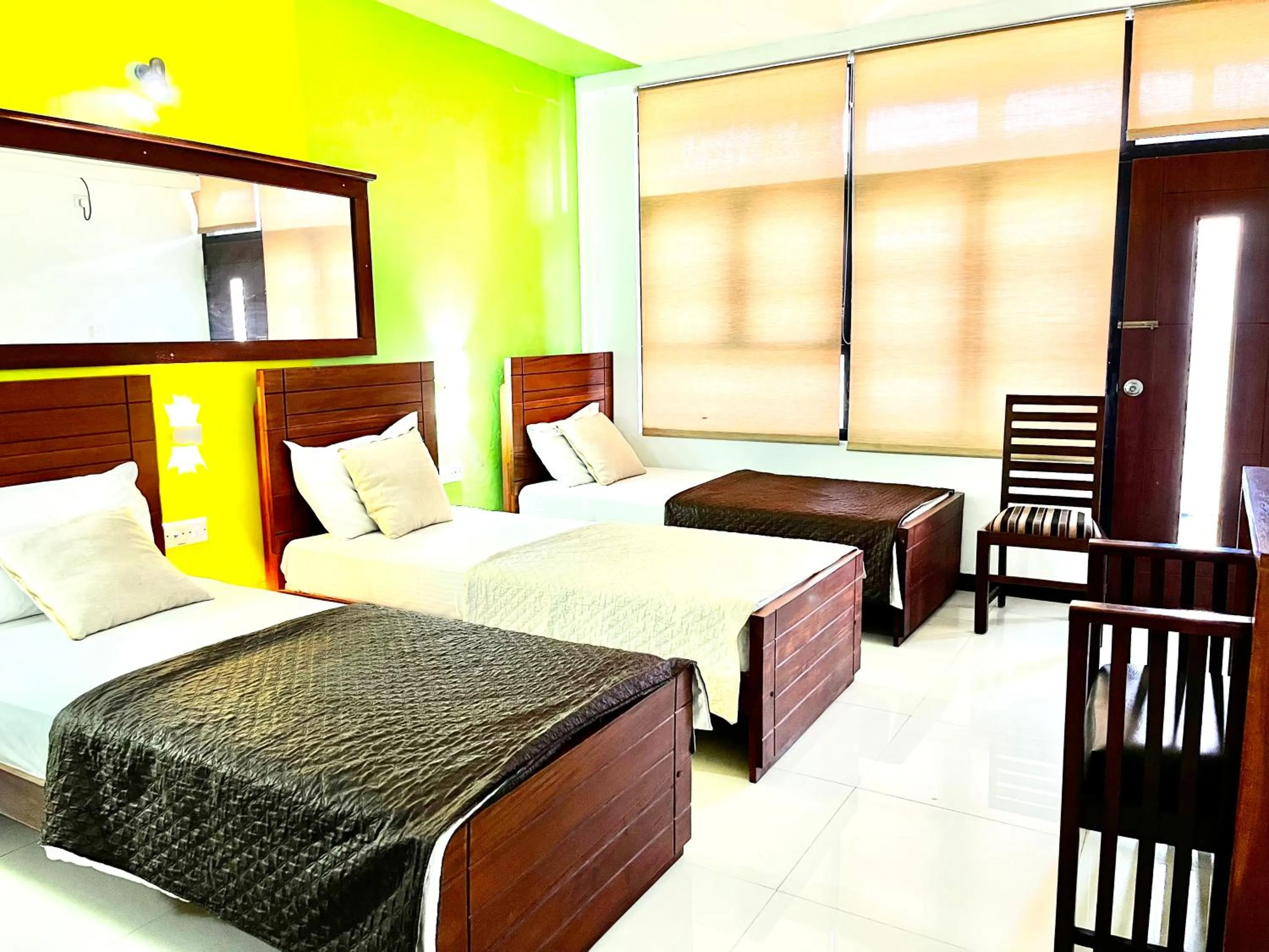 Bed in Subhas Tourist Hotel