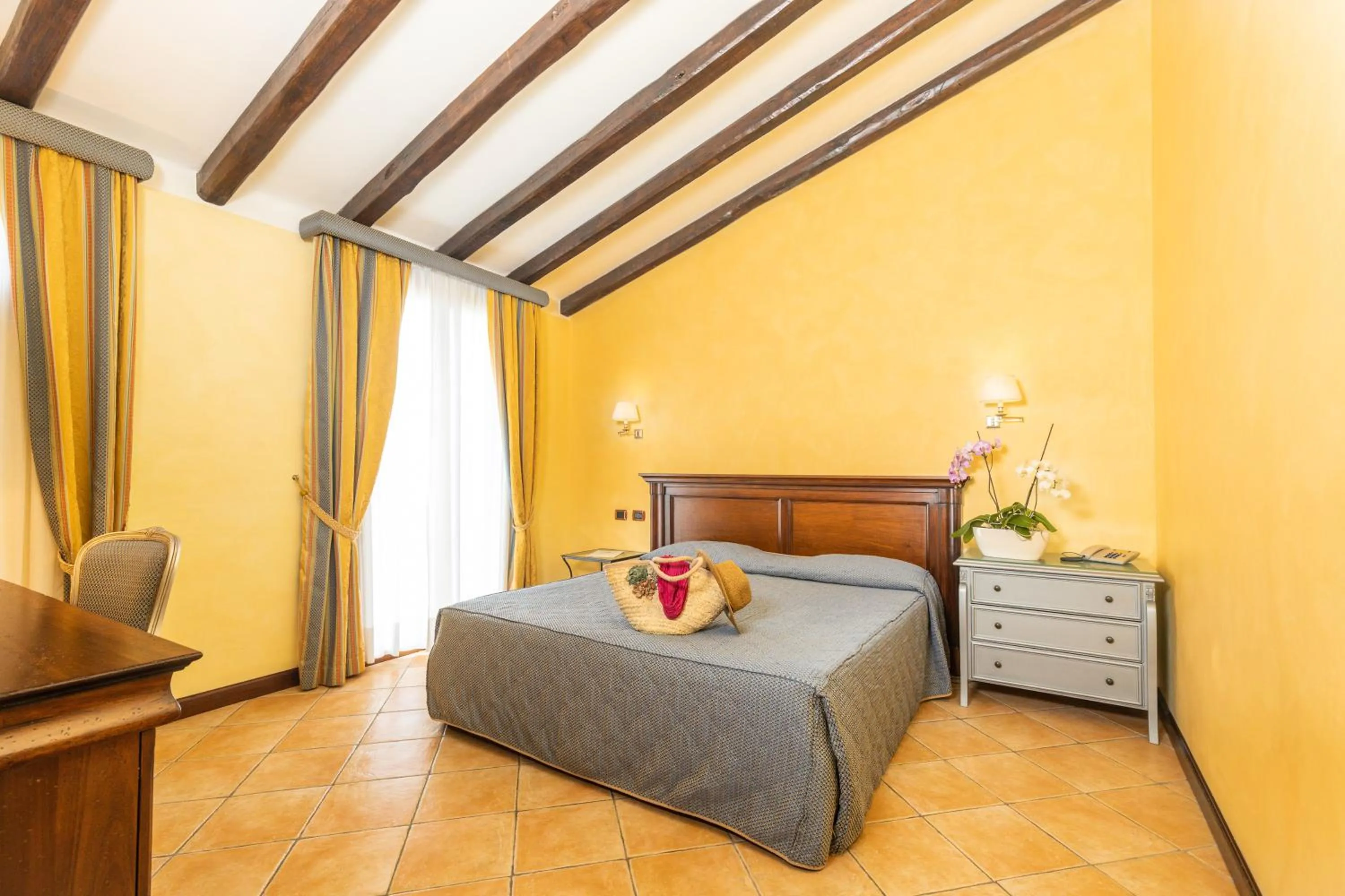 Bed in Hotel Arbatasar