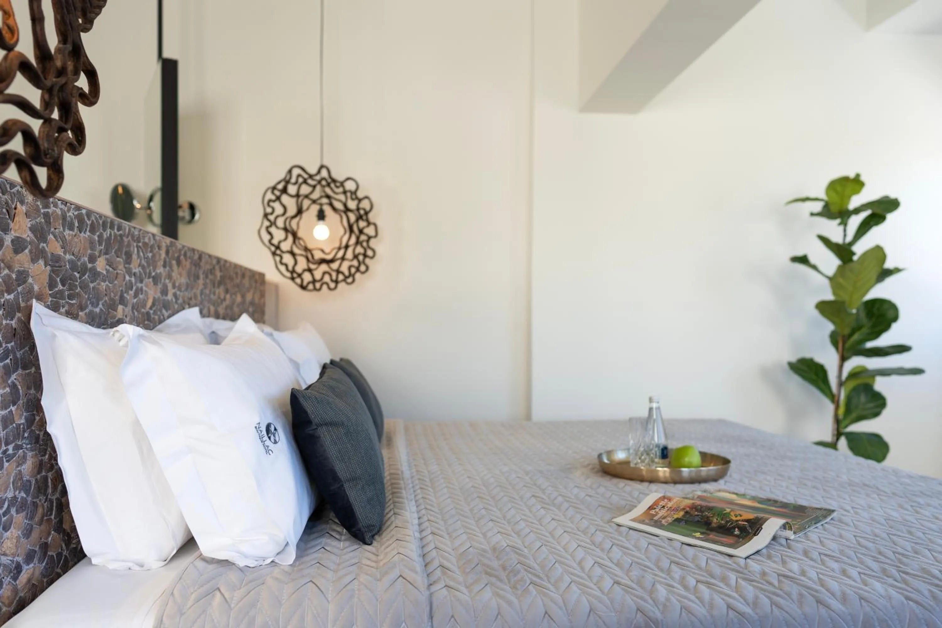 Bed in Naillac Boutique Hotel