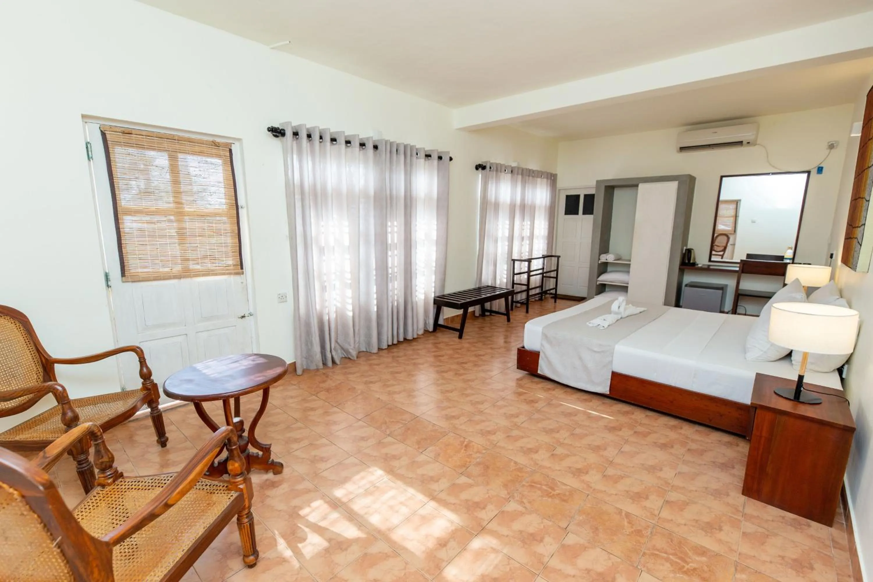 Photo of the whole room, Bed in Shangrela Beach Resort by ARK