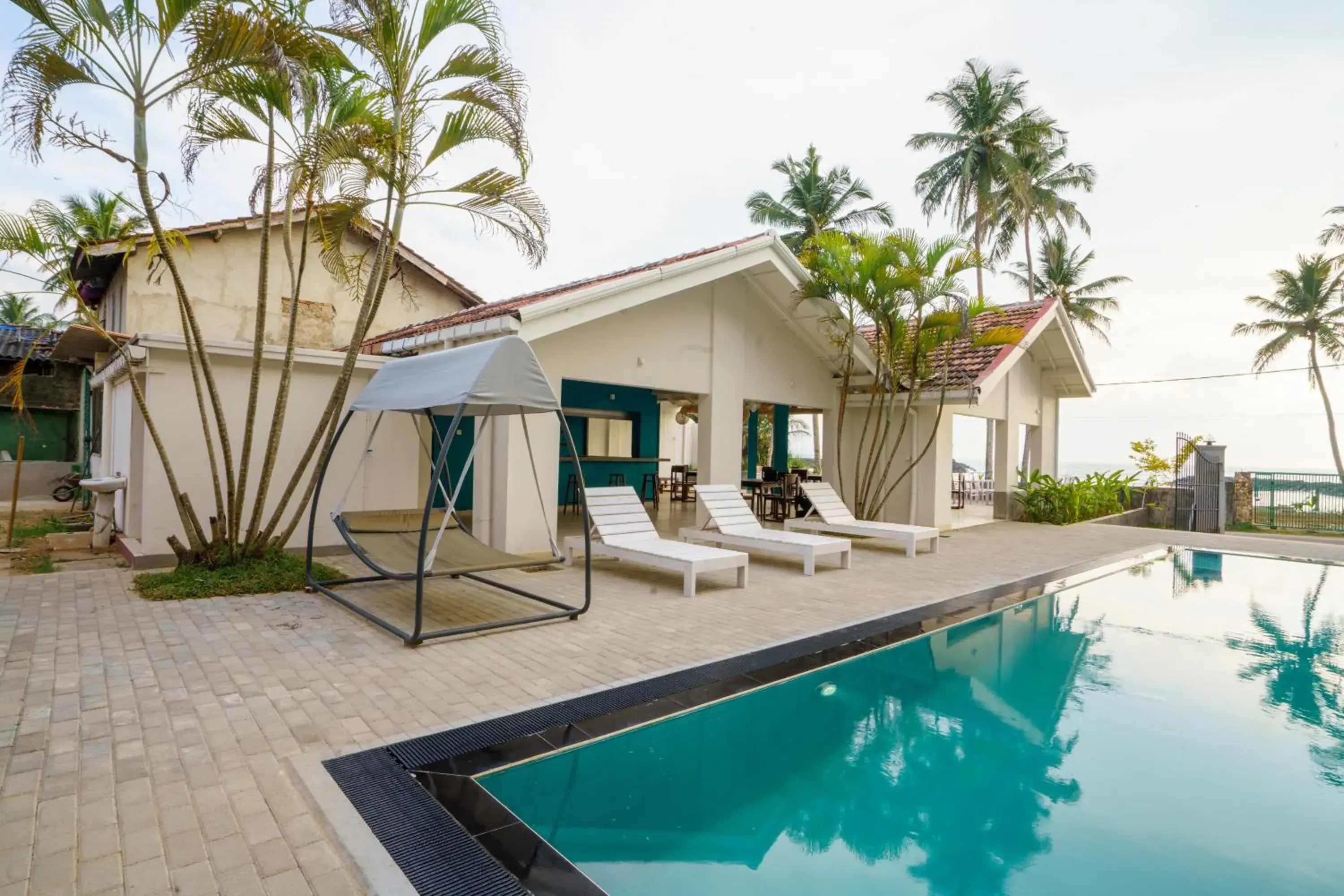 Swimming pool in Shangrela Beach Resort by ARK Swimming pool in Shangrela Beach Resort by ARK