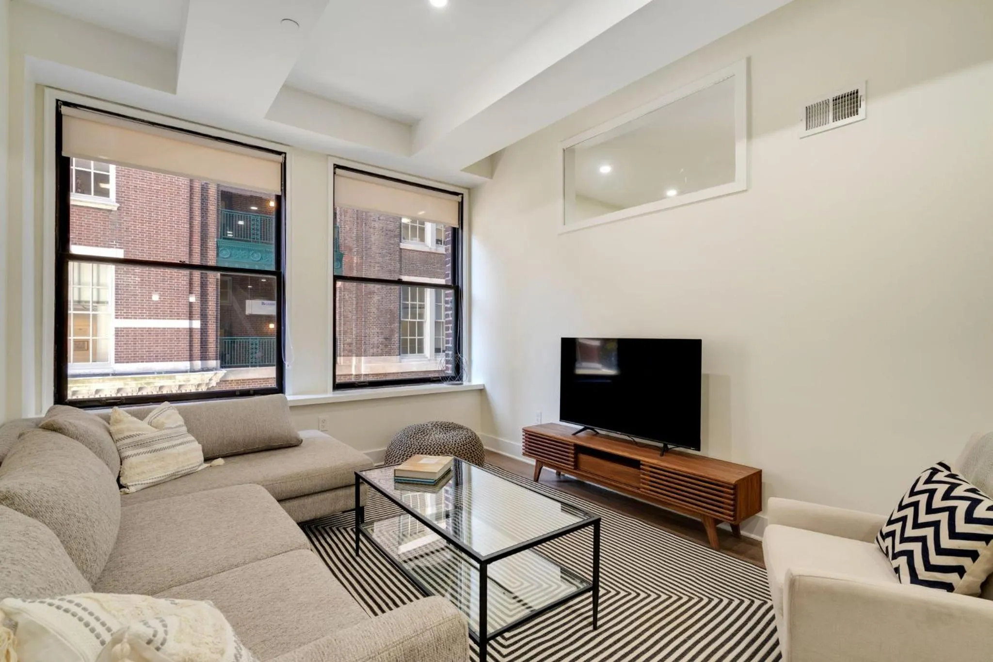Living room in The Ledger Residences by Sosuite - Old City