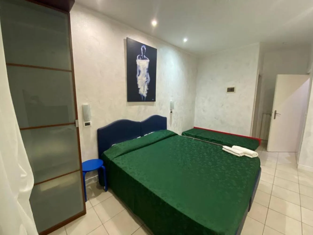 Bed in Pollon Inn Sanremo