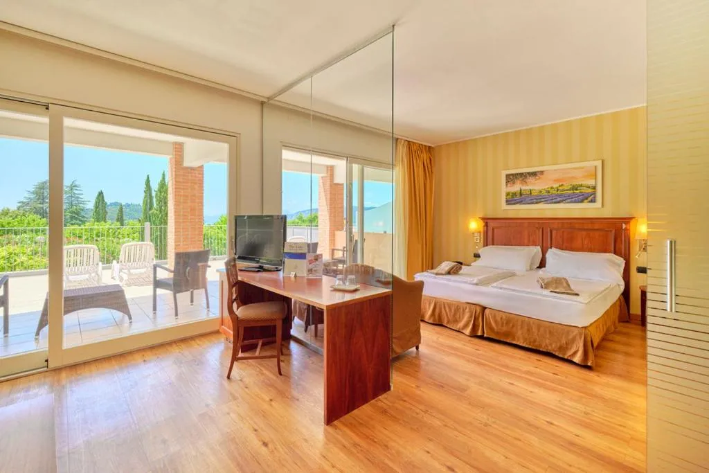 Bed in Hotel Boffenigo - The Golden Hour