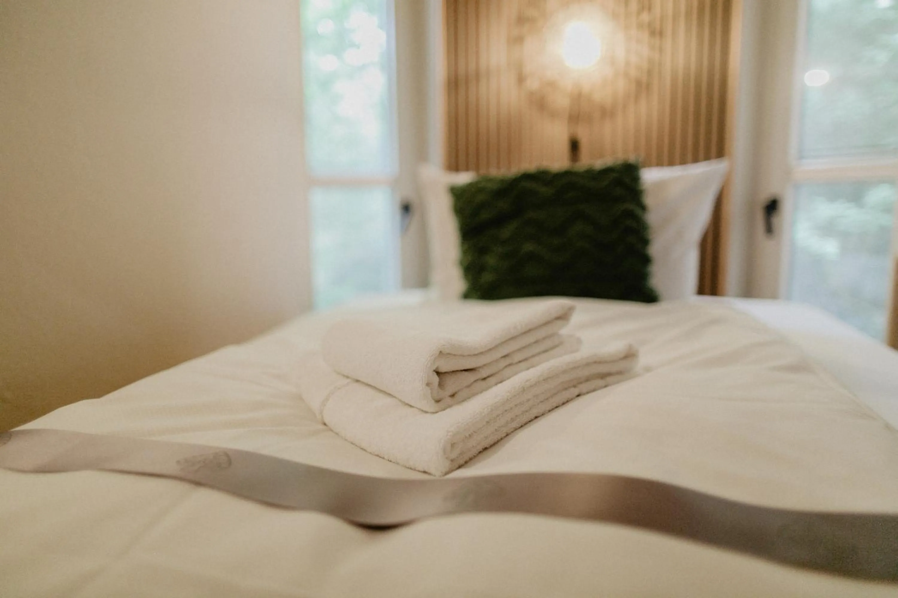 Bed in Peak Hotel & Event