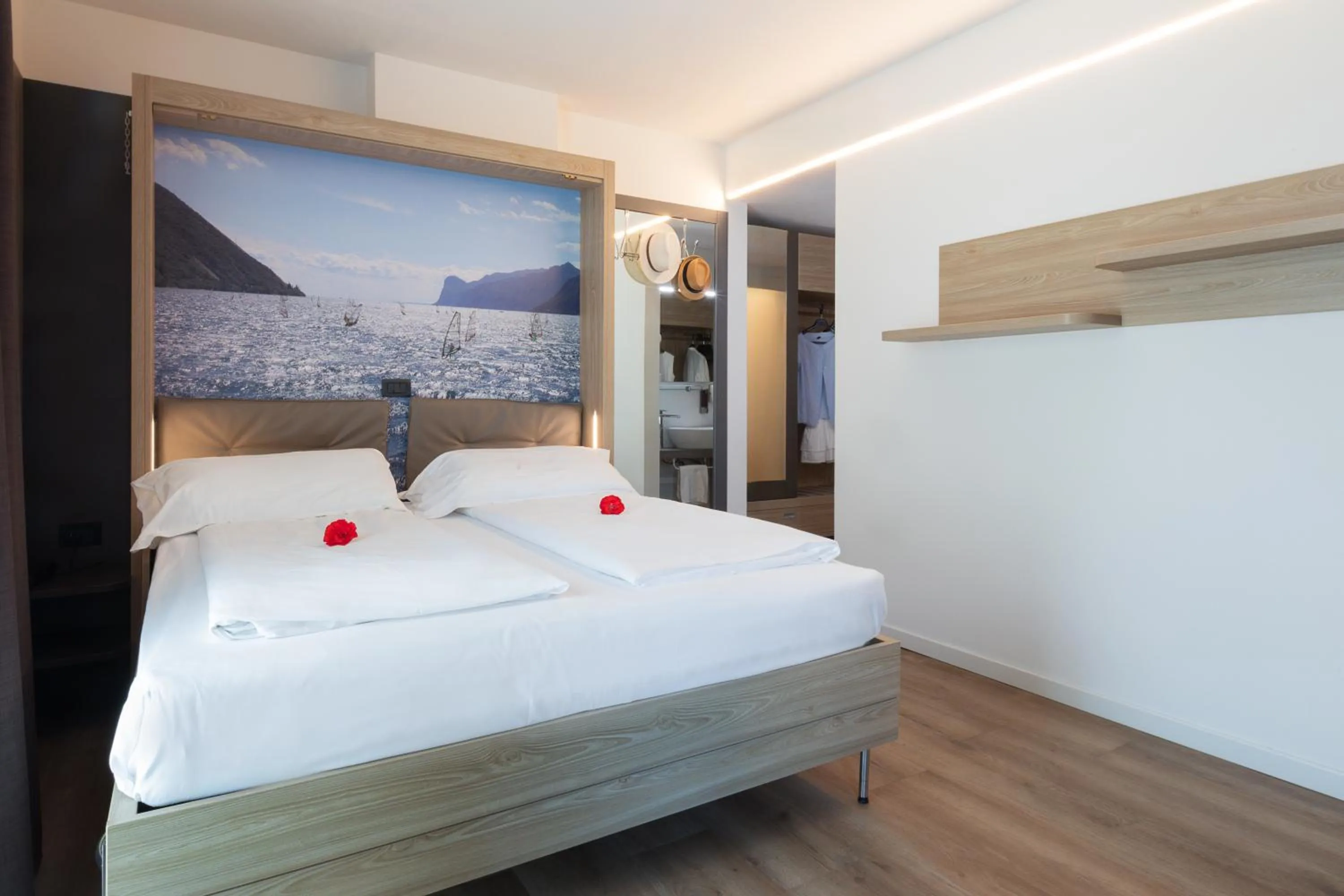 Bed in Ambassador Suite Hotel