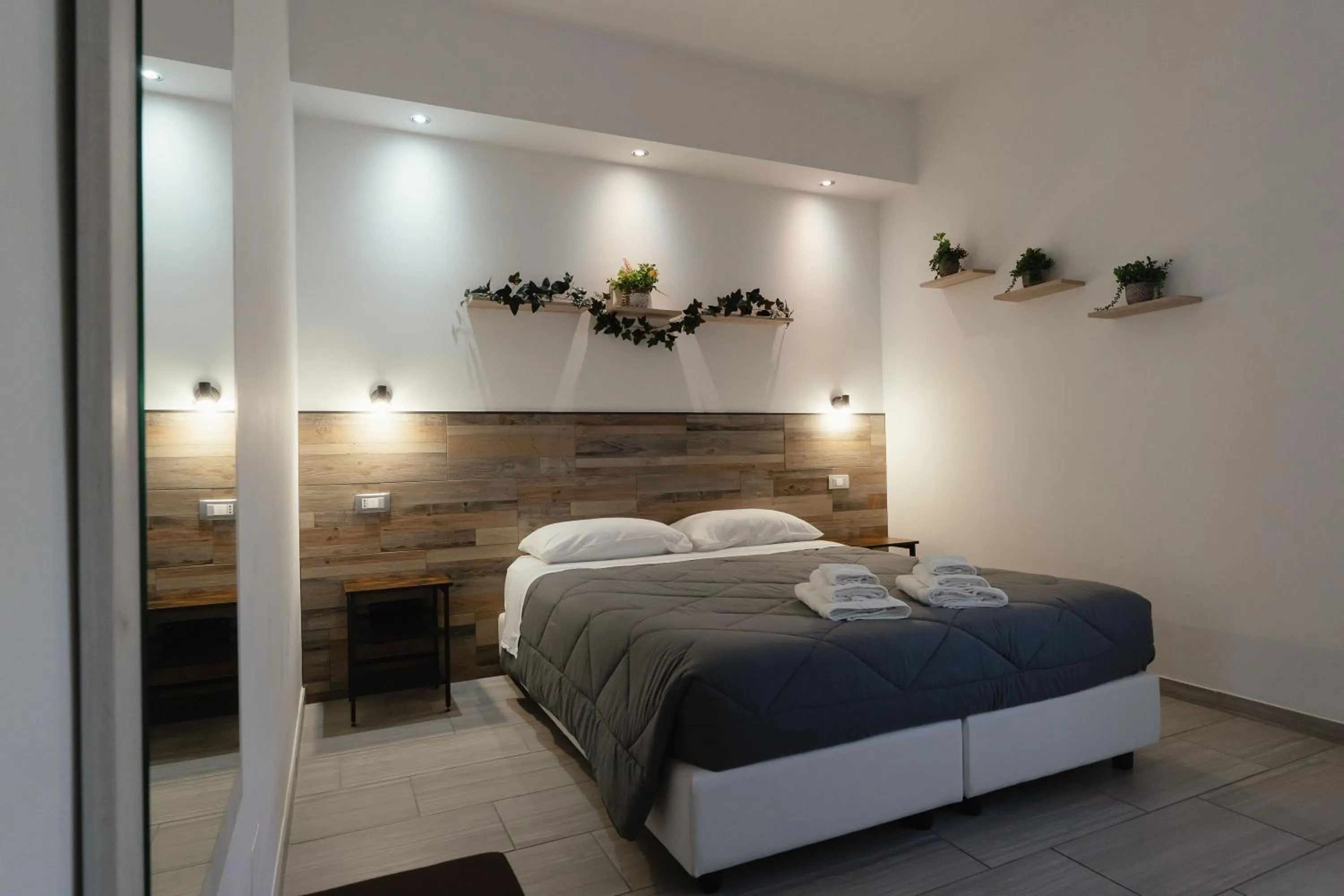 Bed in Zaro Suites B&B