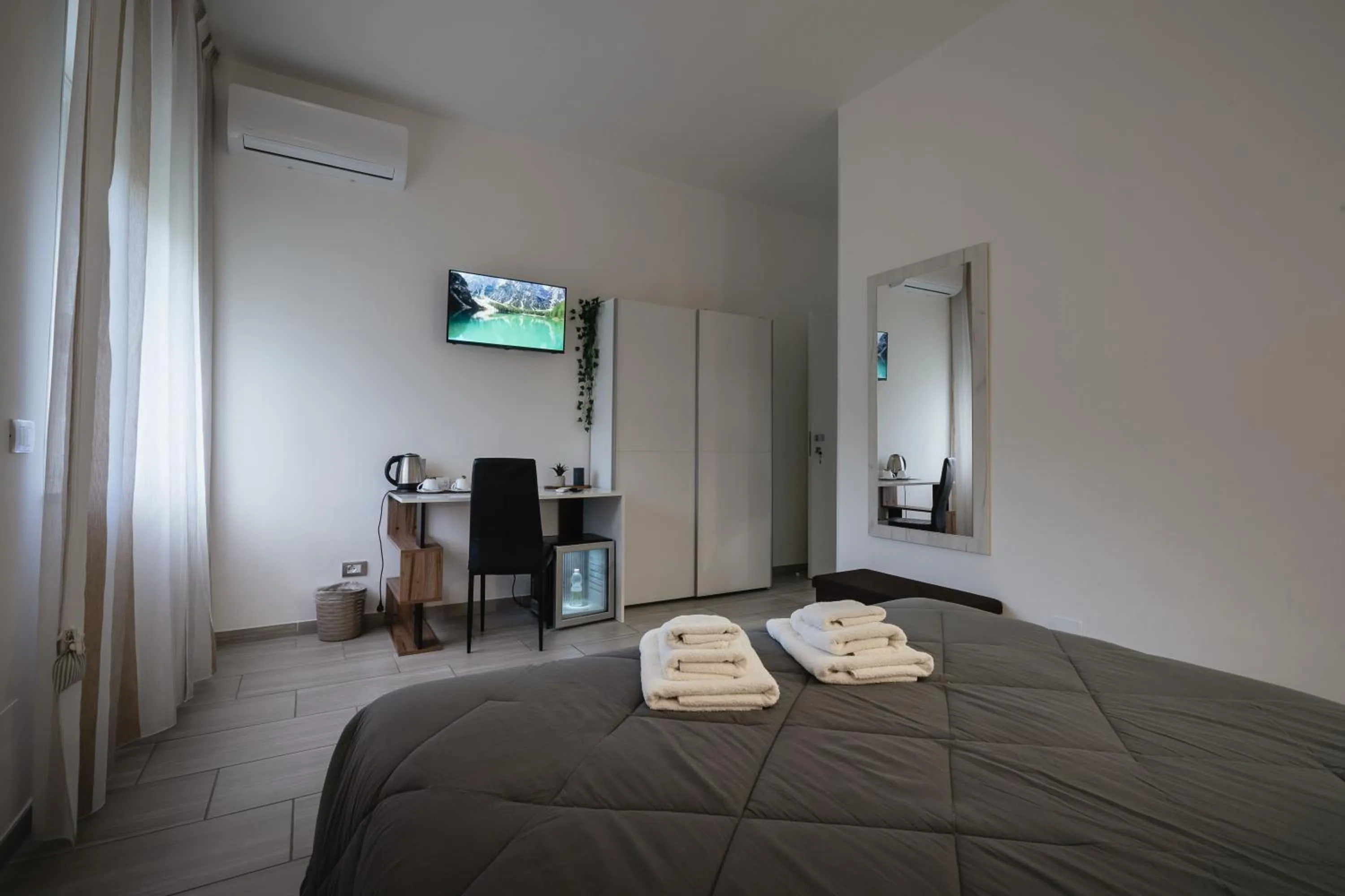 Bed in Zaro Suites B&B