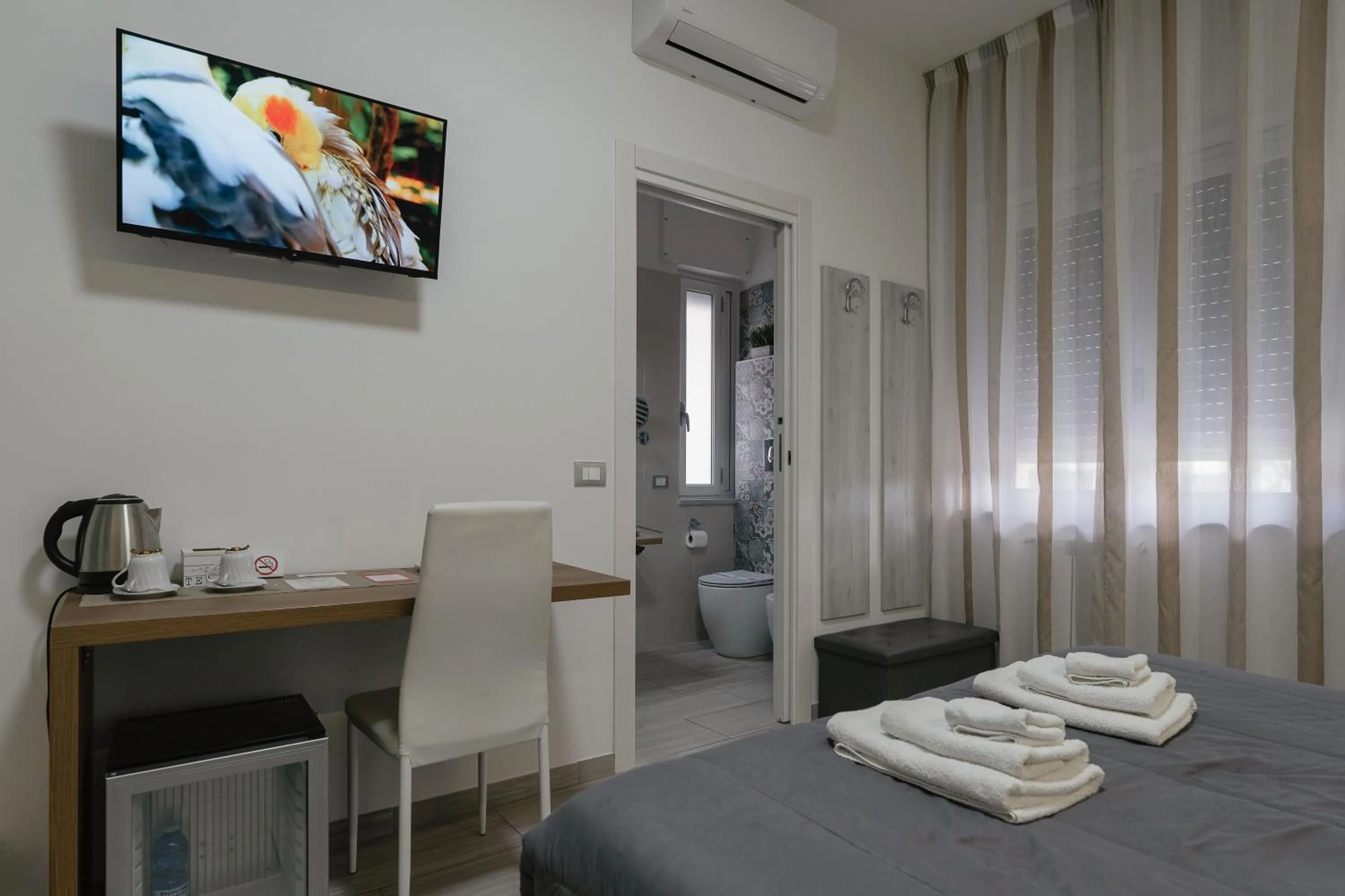 Bed in Zaro Suites B&B