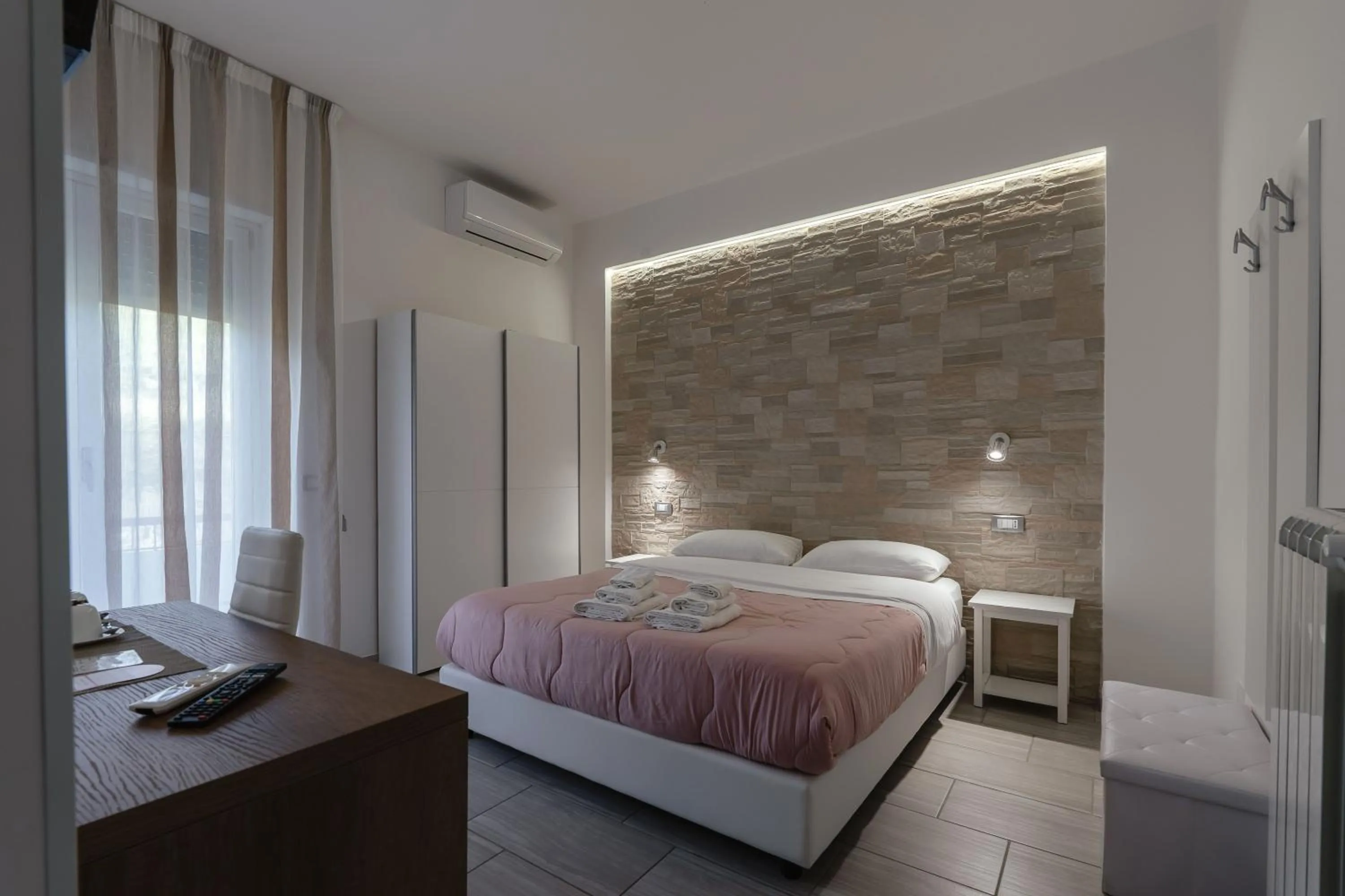 Bed in Zaro Suites B&B