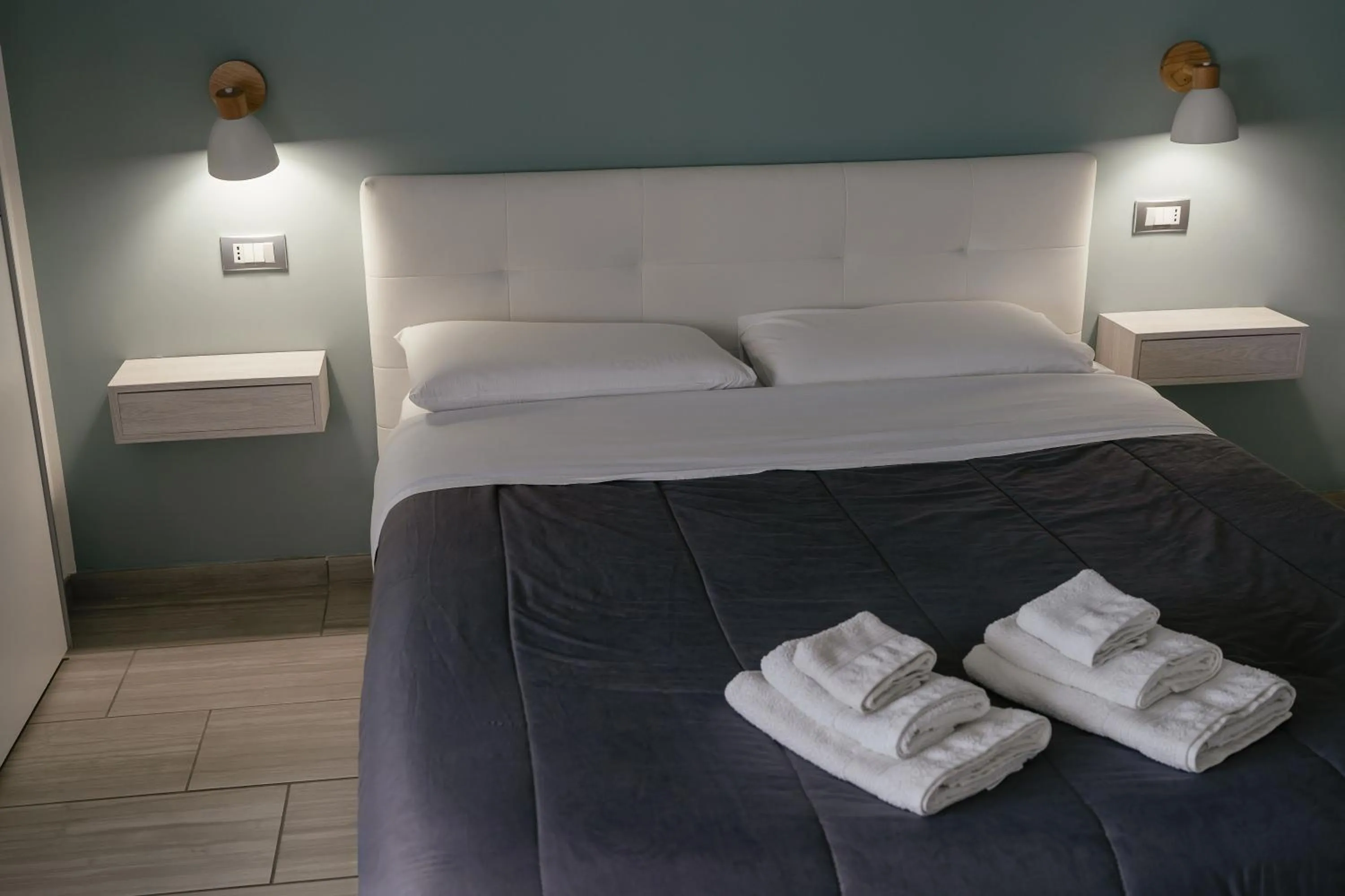 Bed in Zaro Suites B&B