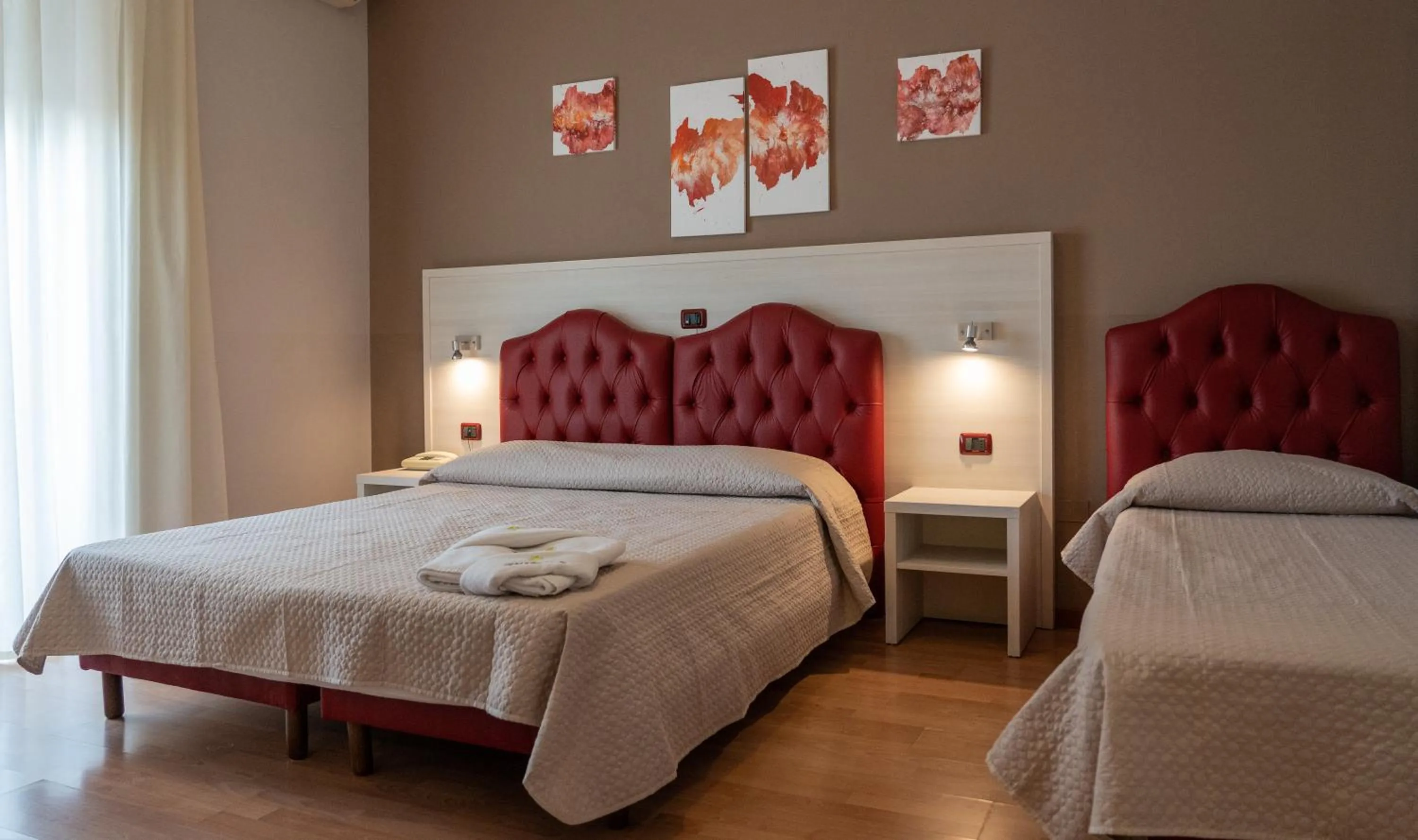 Bed in Hotel Il Quadrifoglio