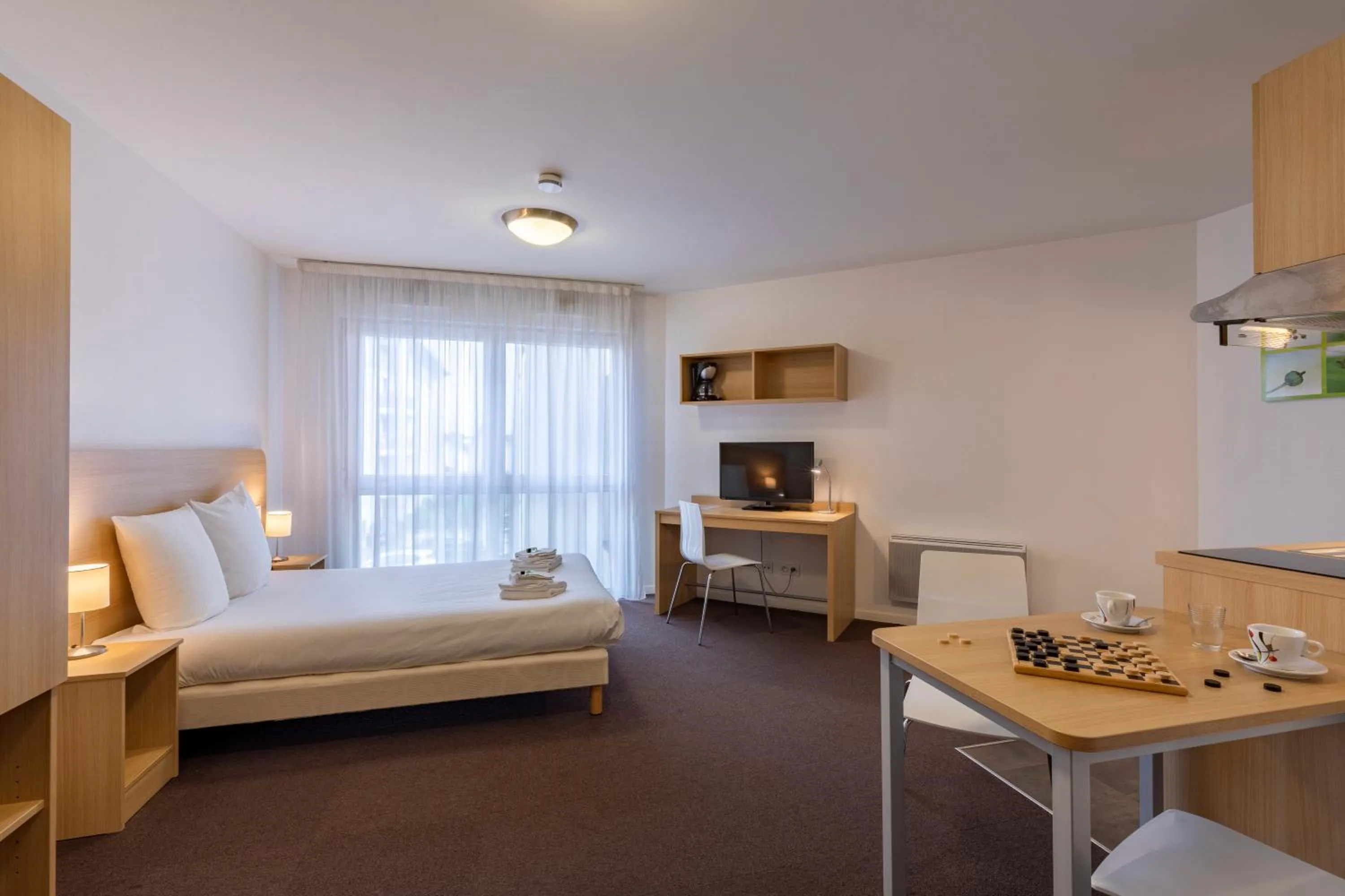 Photo of the whole room in Kosy Appart'hotels Troyes City & Park