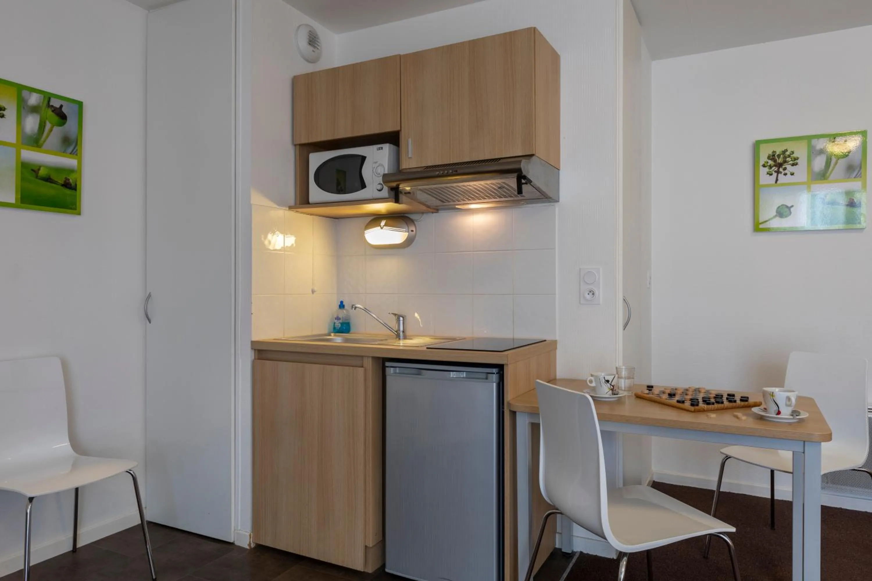 Kitchen or kitchenette in Kosy Appart'hotels Troyes City & Park