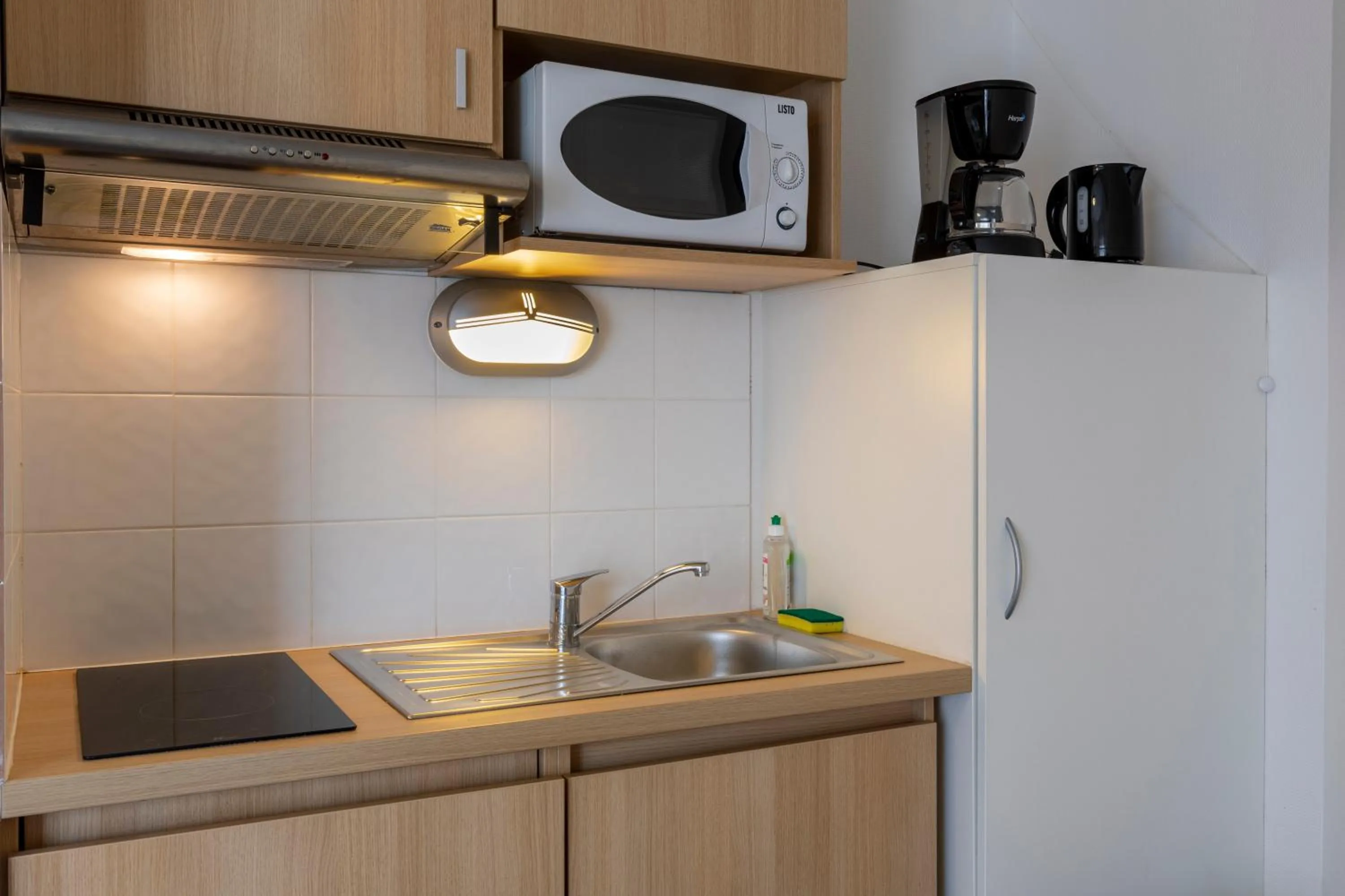 Kitchen or kitchenette in Kosy Appart'hotels Troyes City & Park