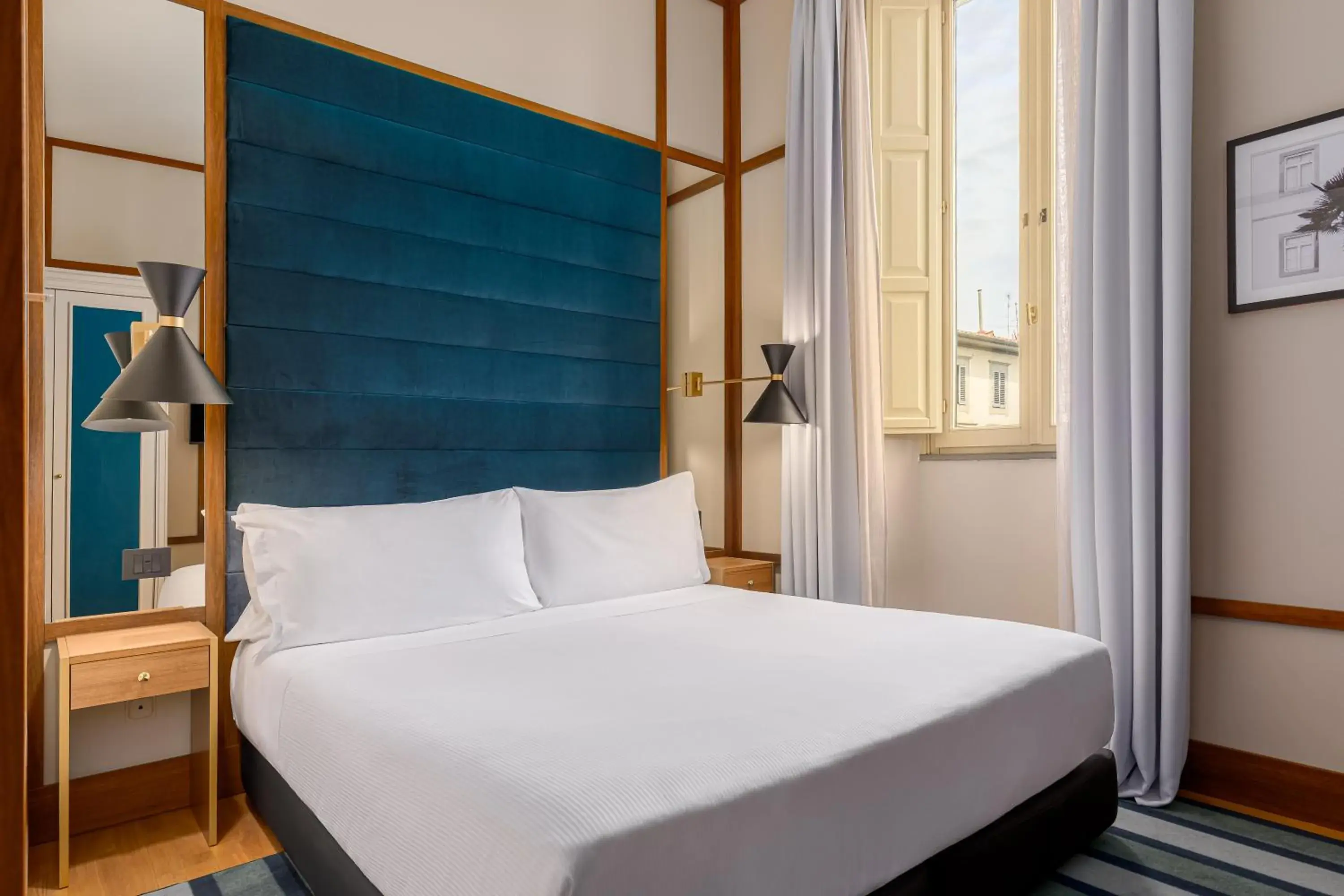 Bed in Room Mate Luca, Florence Bed in Room Mate Luca, Florence