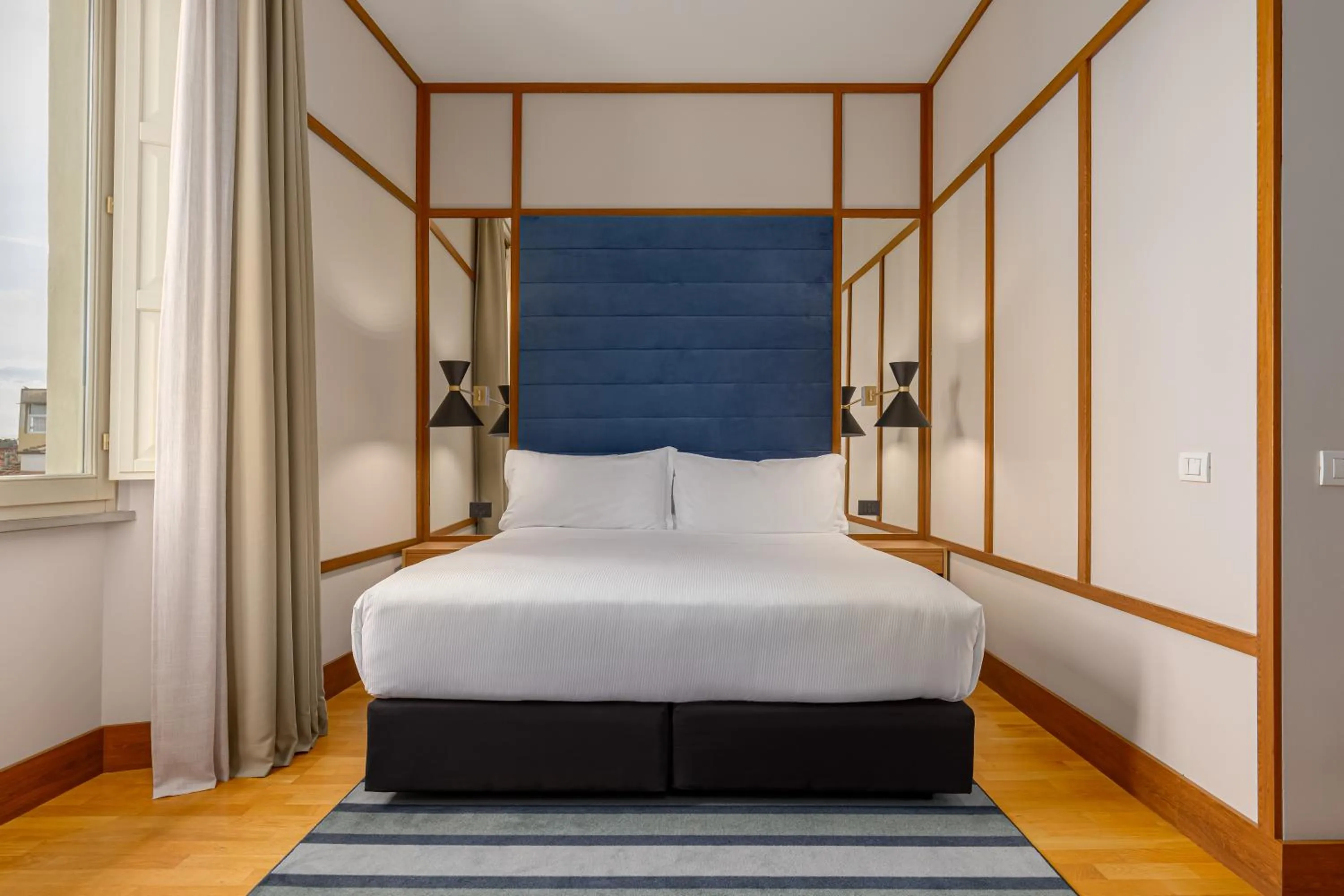 Bed in Room Mate Luca, Florence