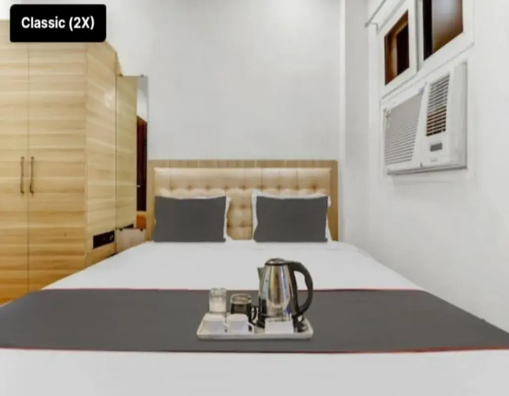 Deluxe Double Room (2 Adults + 1 Child) in Shri Tirupati Residency Deluxe Double Room (2 Adults + 1 Child) in Shri Tirupati Residency