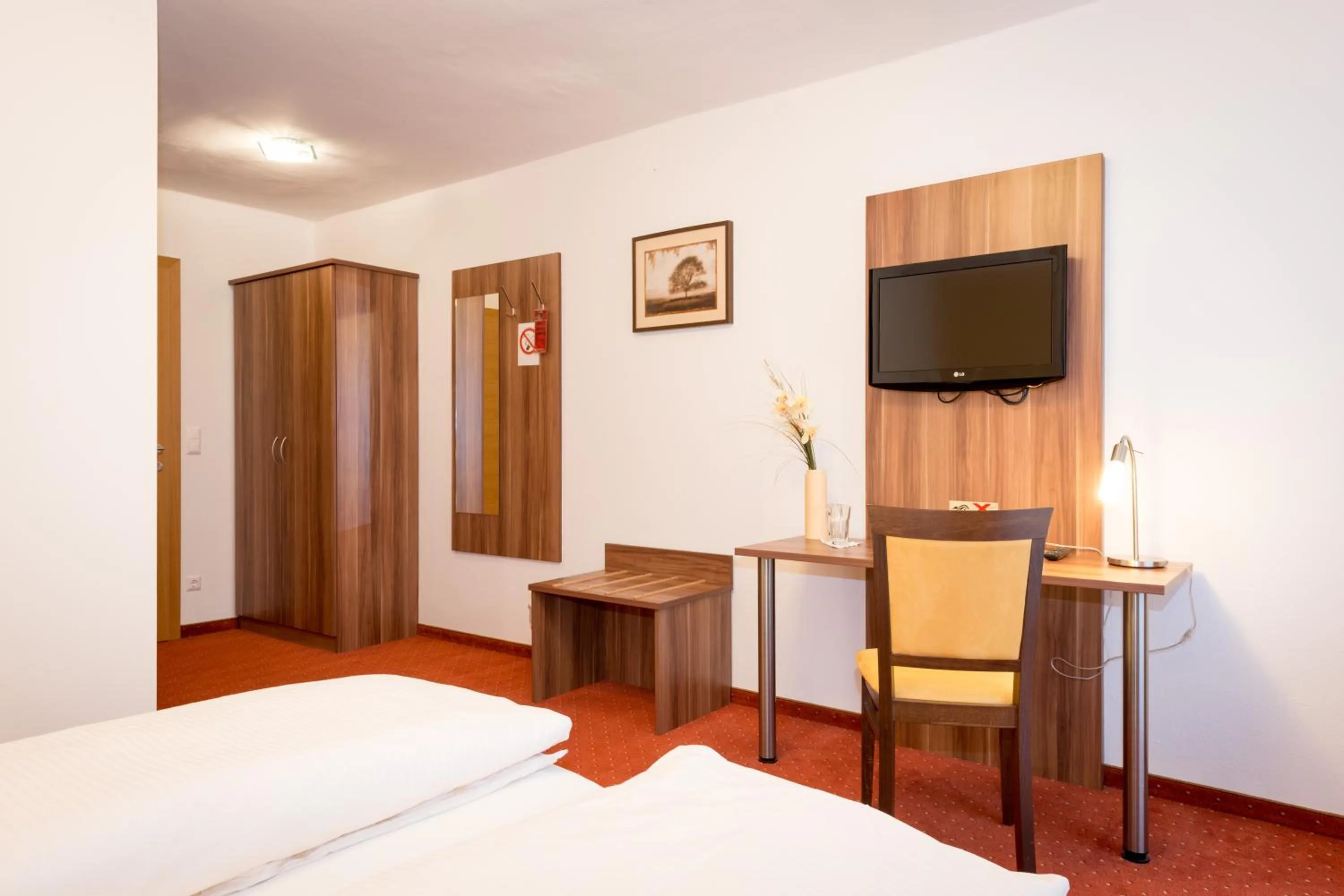 Decorative detail, Bed in Kirchenwirt Irrsdorf Familie Schinwald