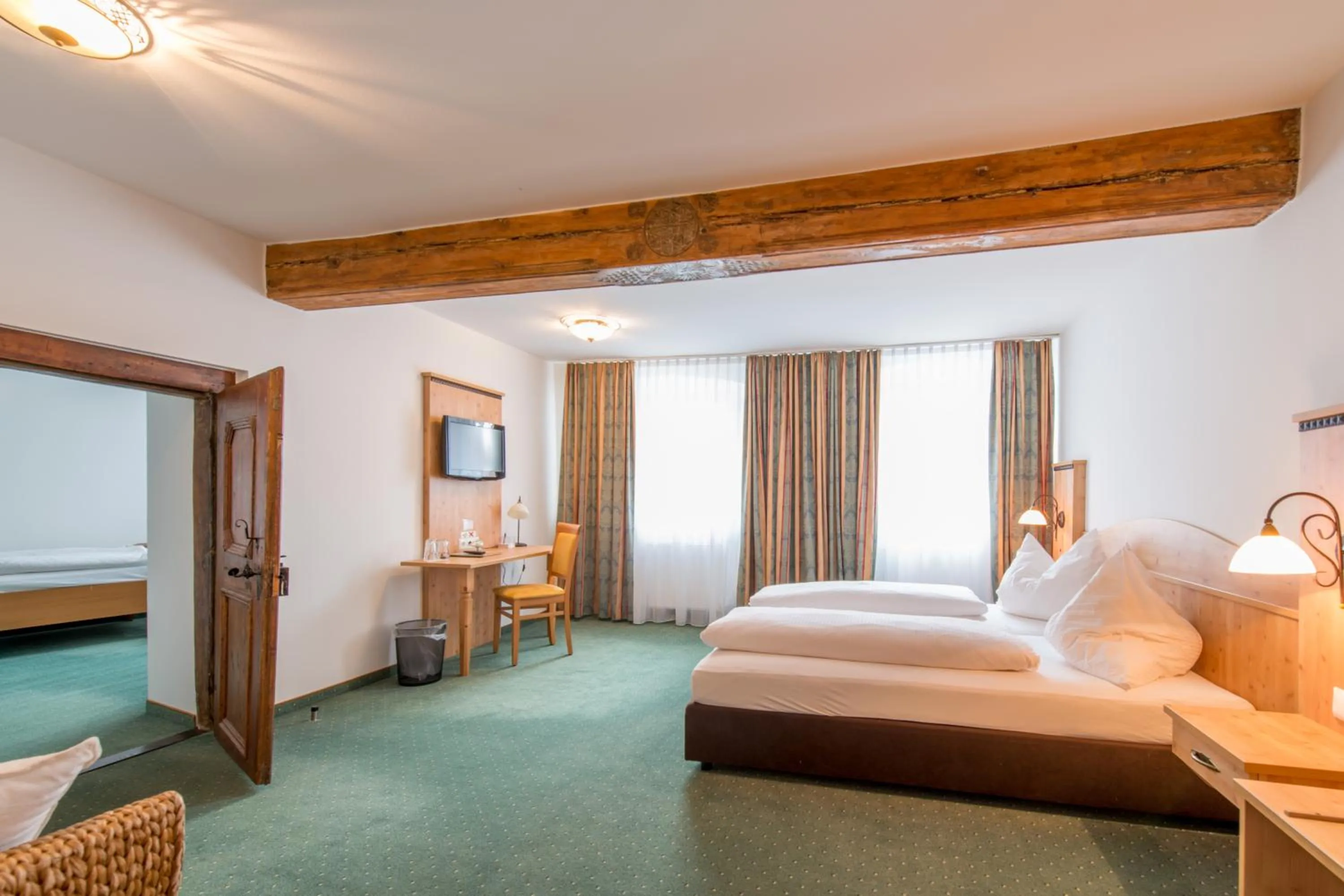 Photo of the whole room, Bed in Kirchenwirt Irrsdorf Familie Schinwald