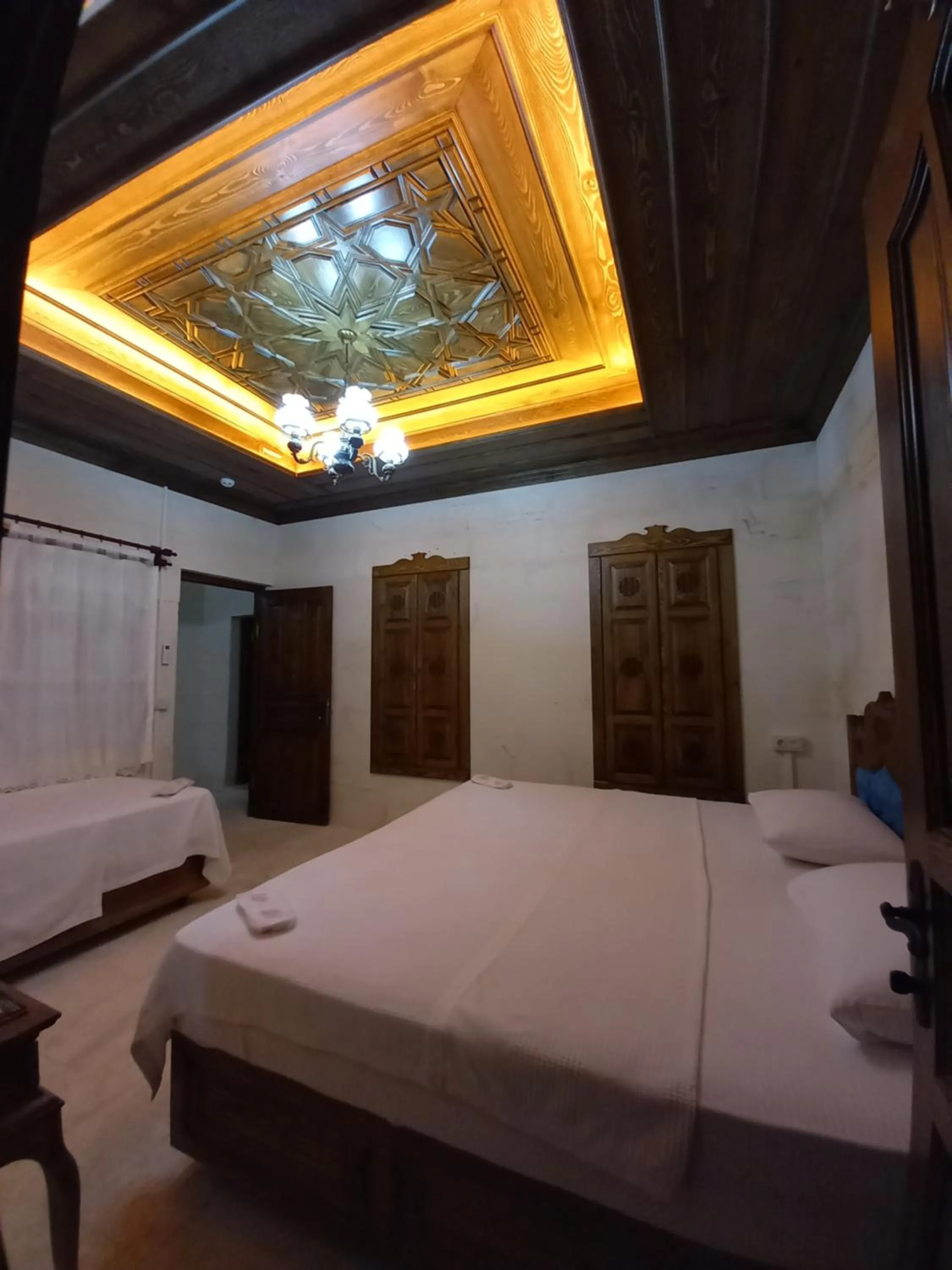 Bed in TÜRKMEN KONAGI HALFETİ BUTİK OTEL