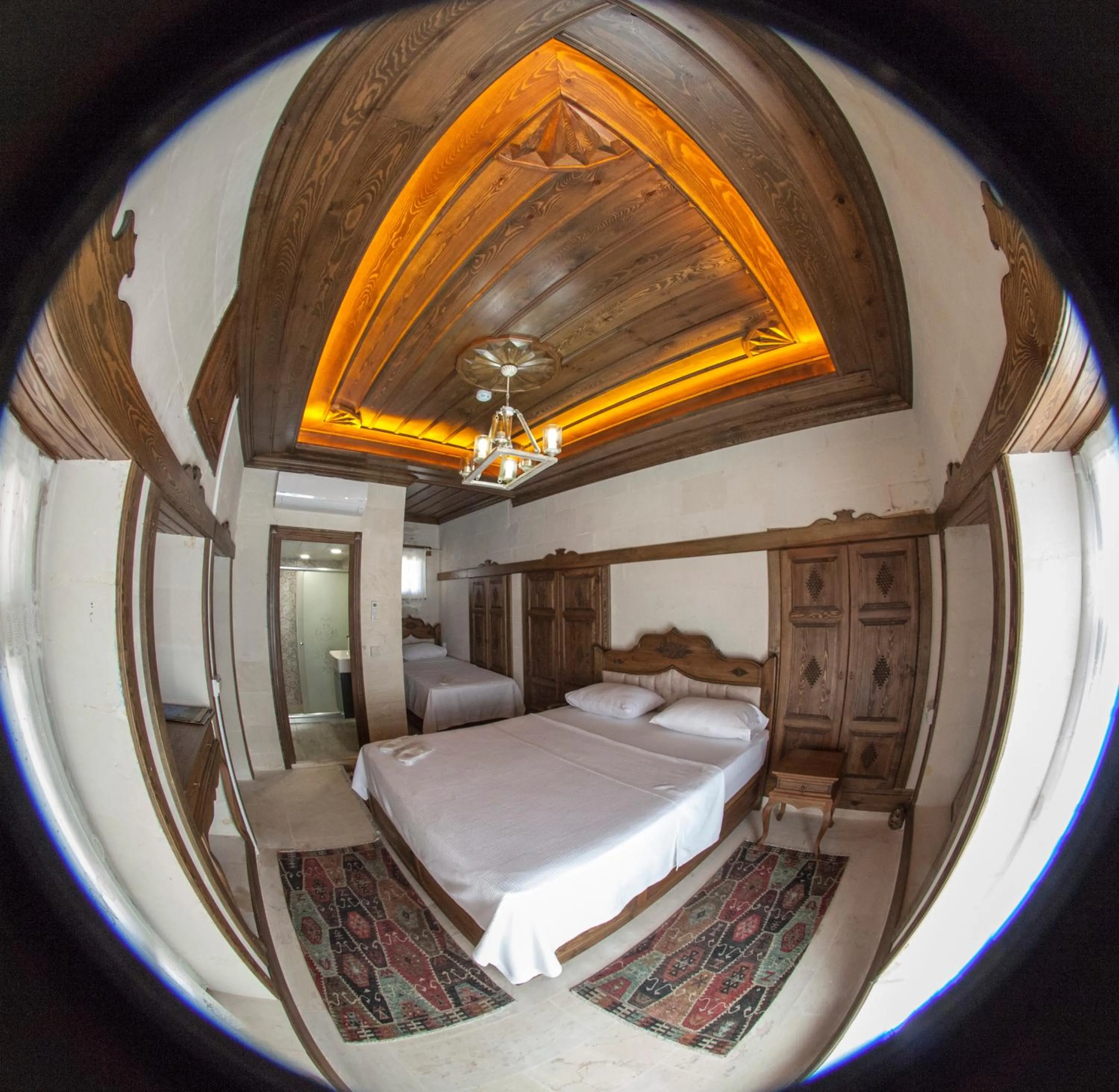 Bed in TÜRKMEN KONAGI HALFETİ BUTİK OTEL