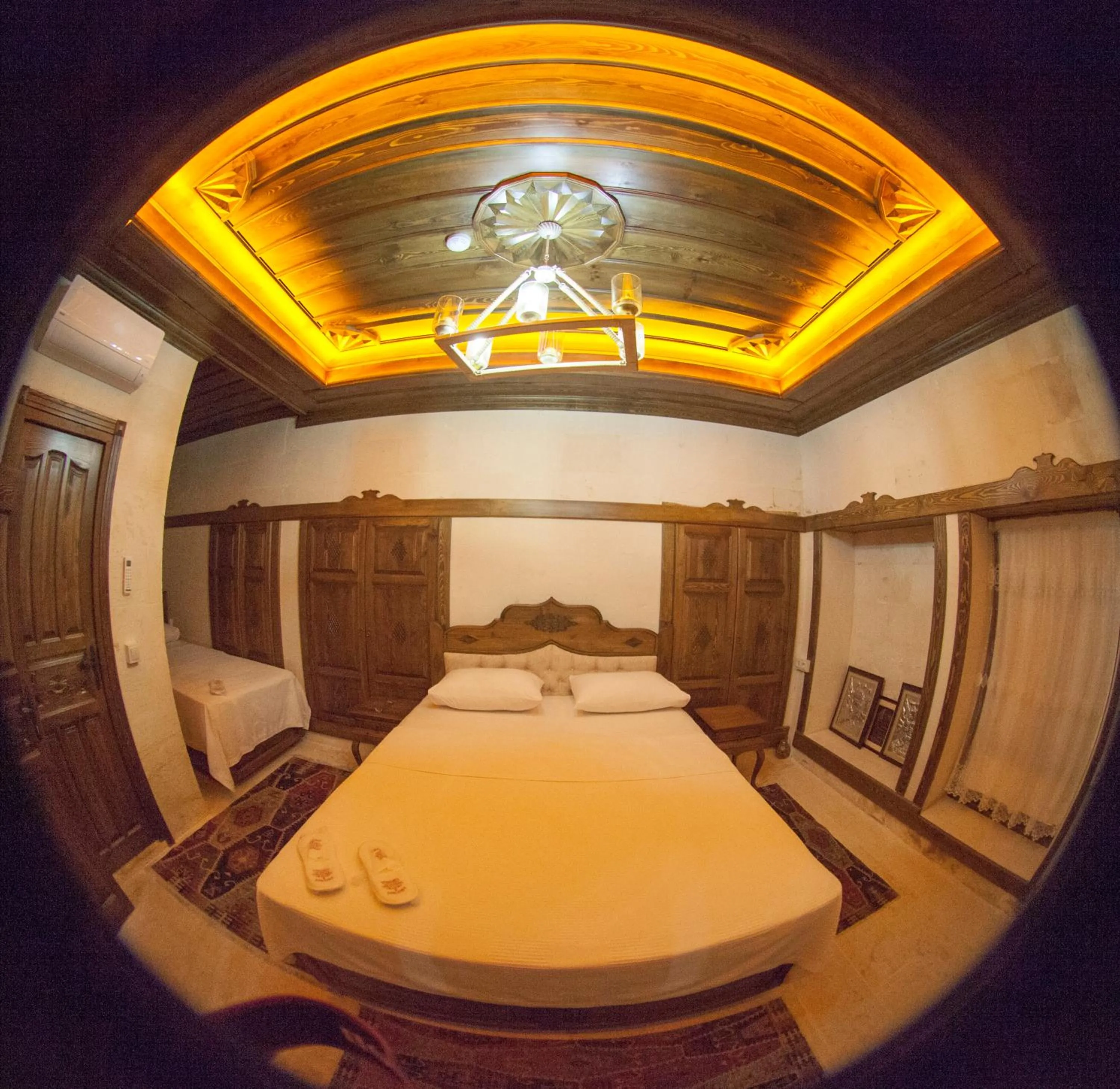 Bed in TÜRKMEN KONAGI HALFETİ BUTİK OTEL
