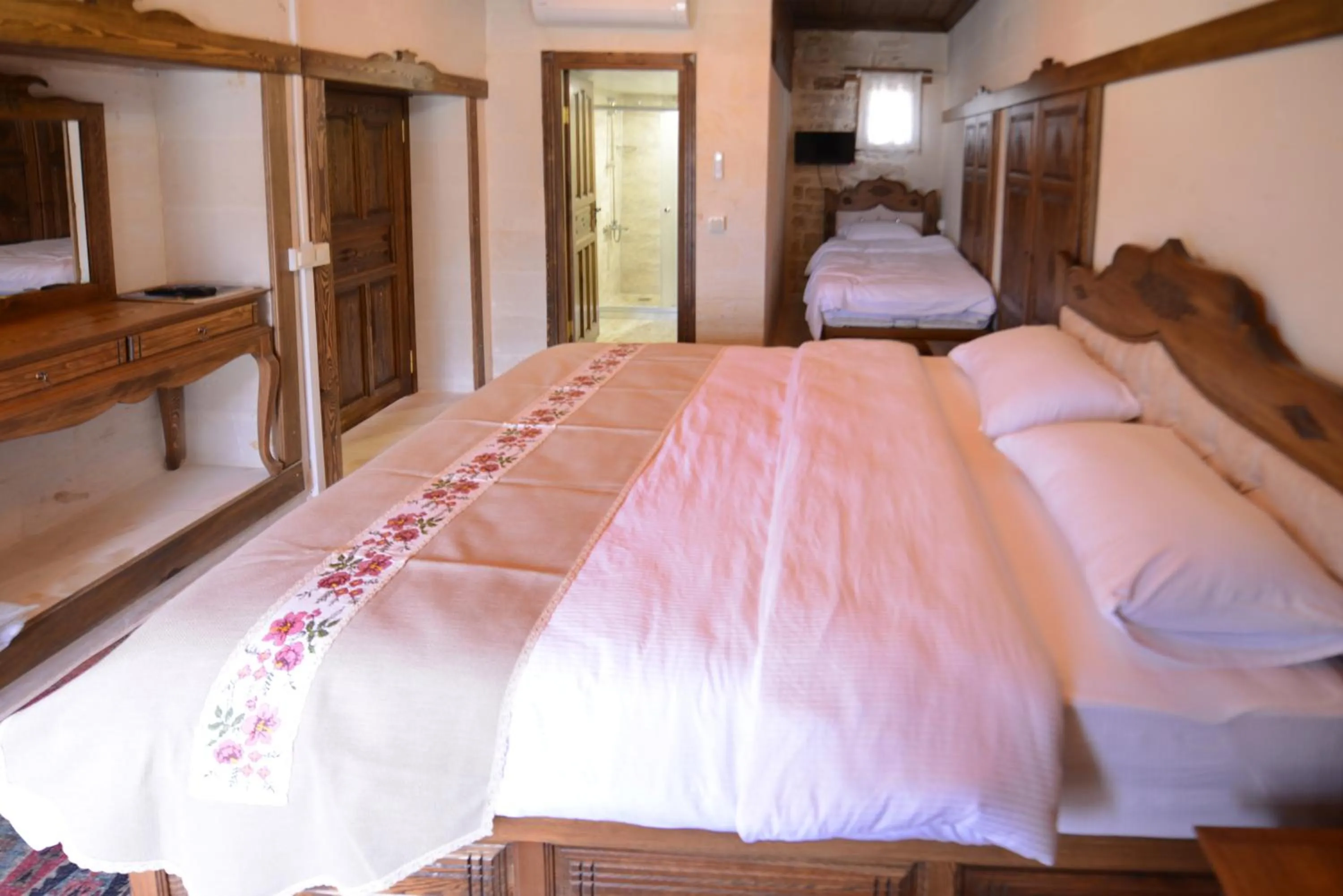 Bed in TÜRKMEN KONAGI HALFETİ BUTİK OTEL