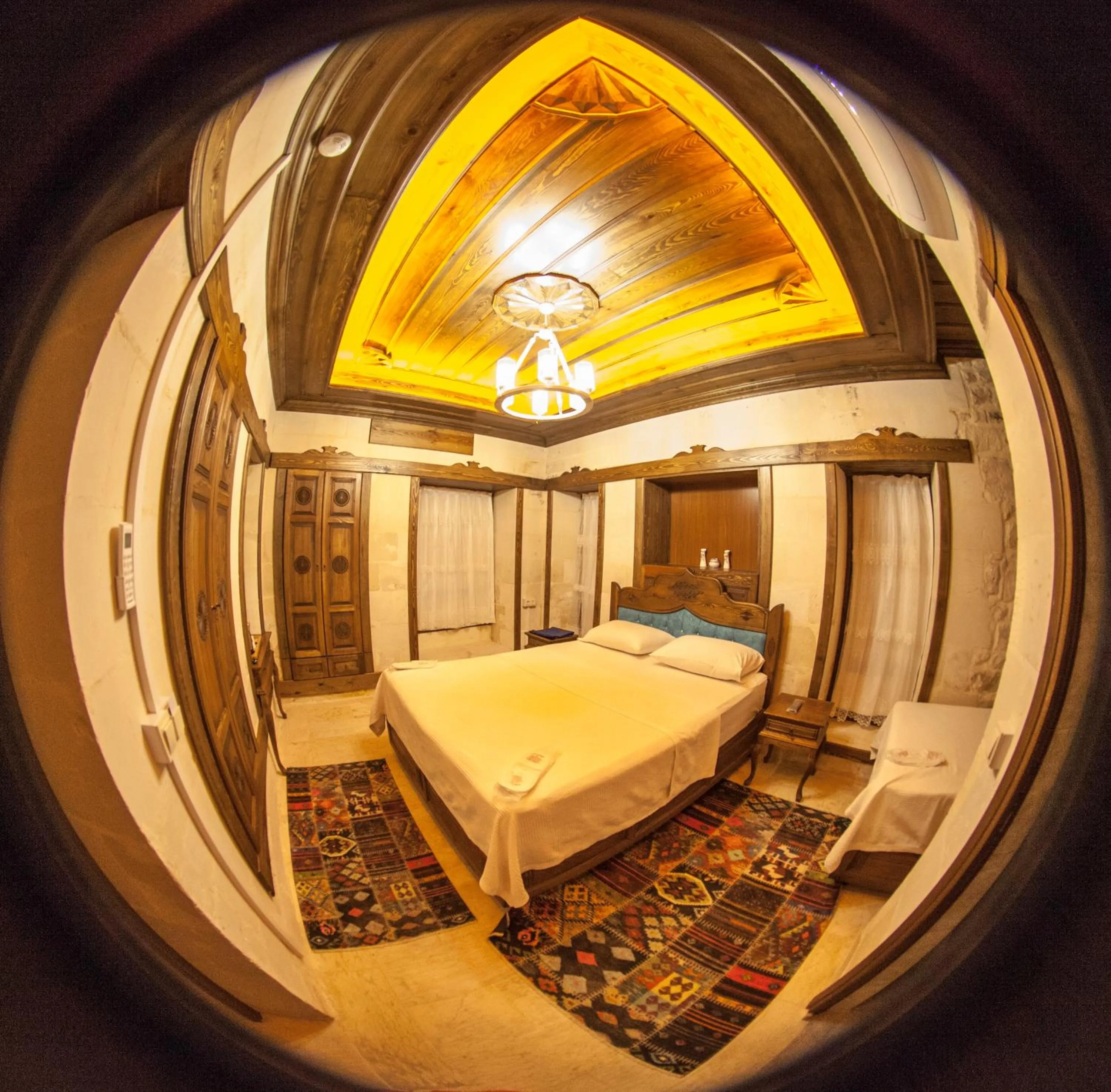 Bed in TÜRKMEN KONAGI HALFETİ BUTİK OTEL