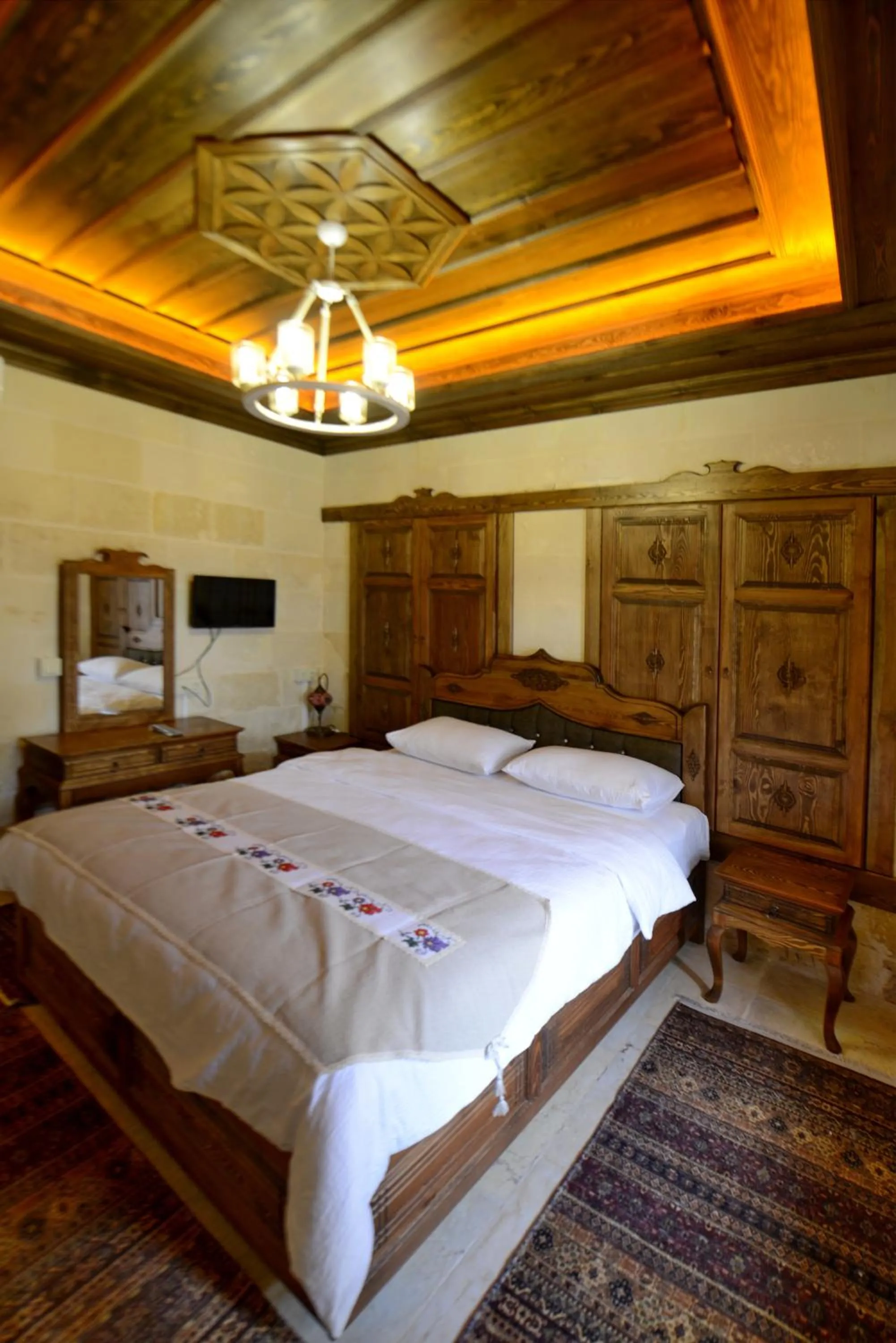 Bed in TÜRKMEN KONAGI HALFETİ BUTİK OTEL