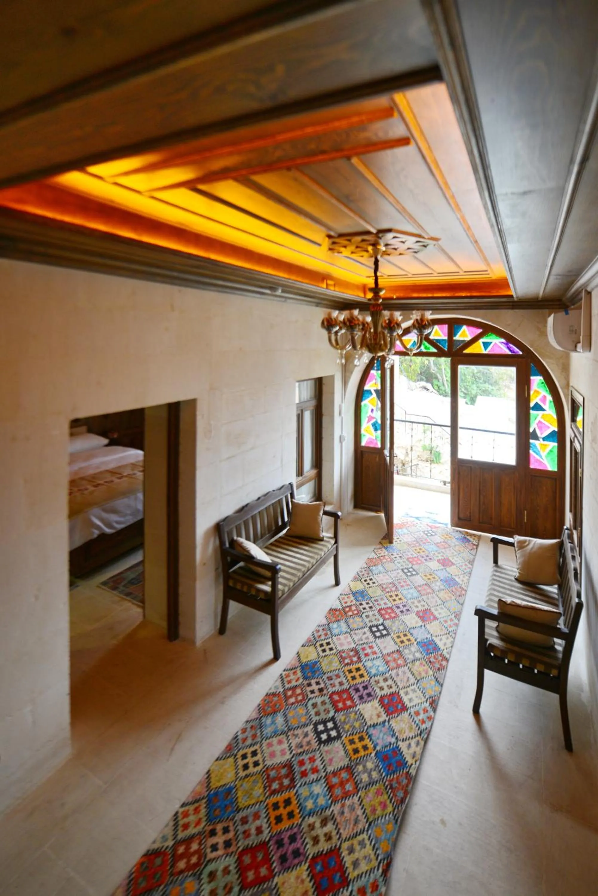 Seating area, Bed in TÜRKMEN KONAGI HALFETİ BUTİK OTEL