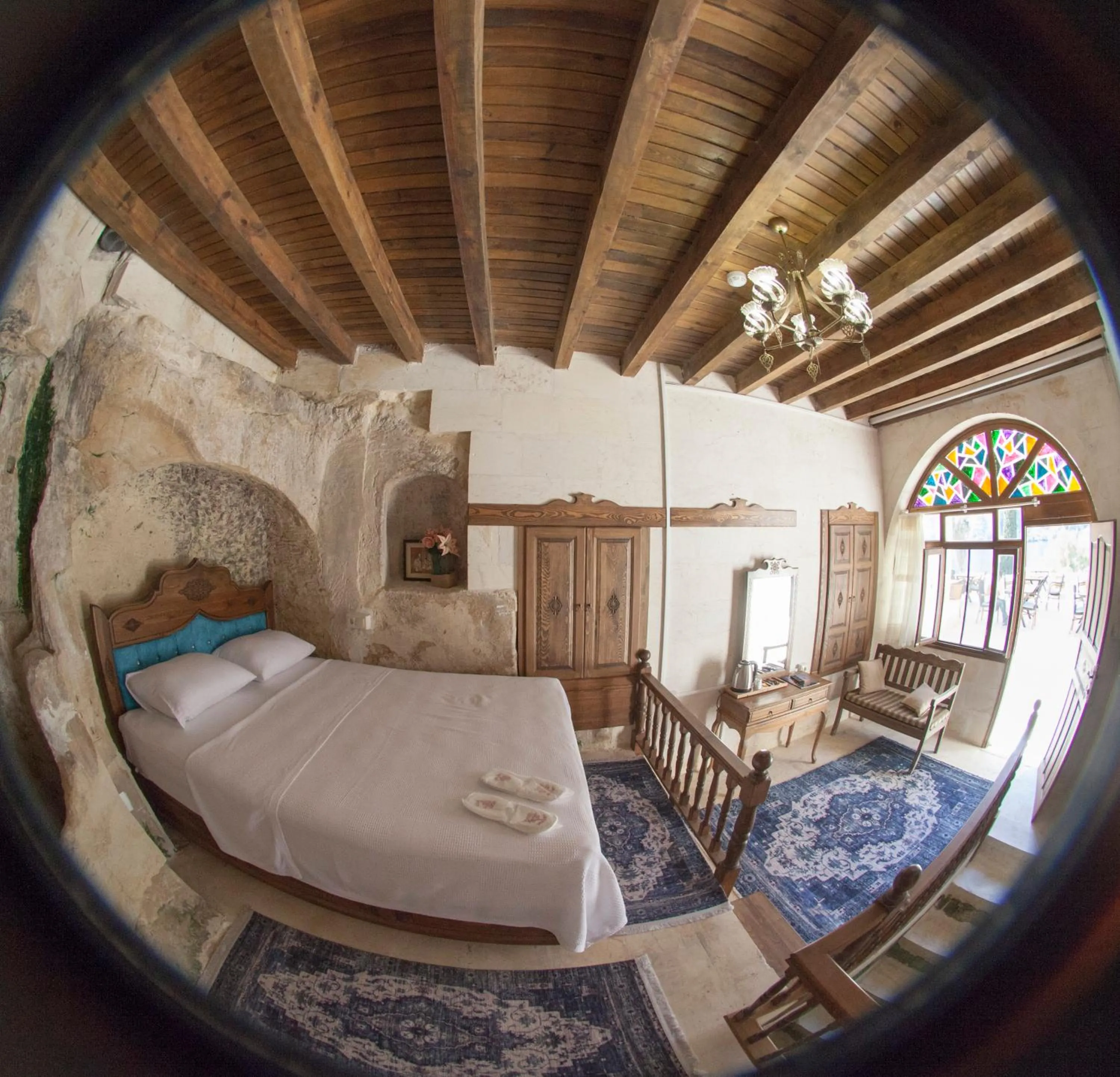Bed in TÜRKMEN KONAGI HALFETİ BUTİK OTEL