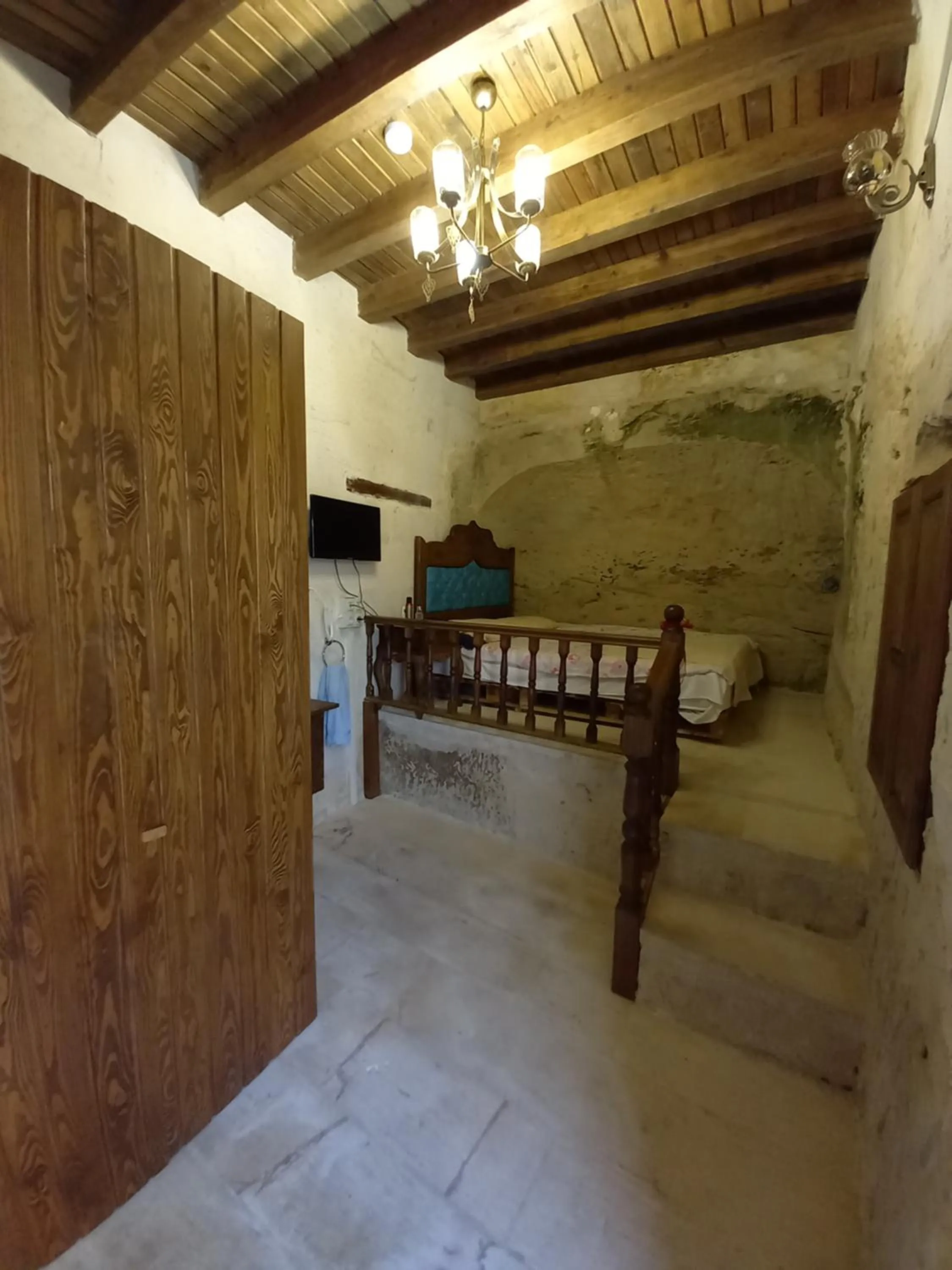 Bed in TÜRKMEN KONAGI HALFETİ BUTİK OTEL