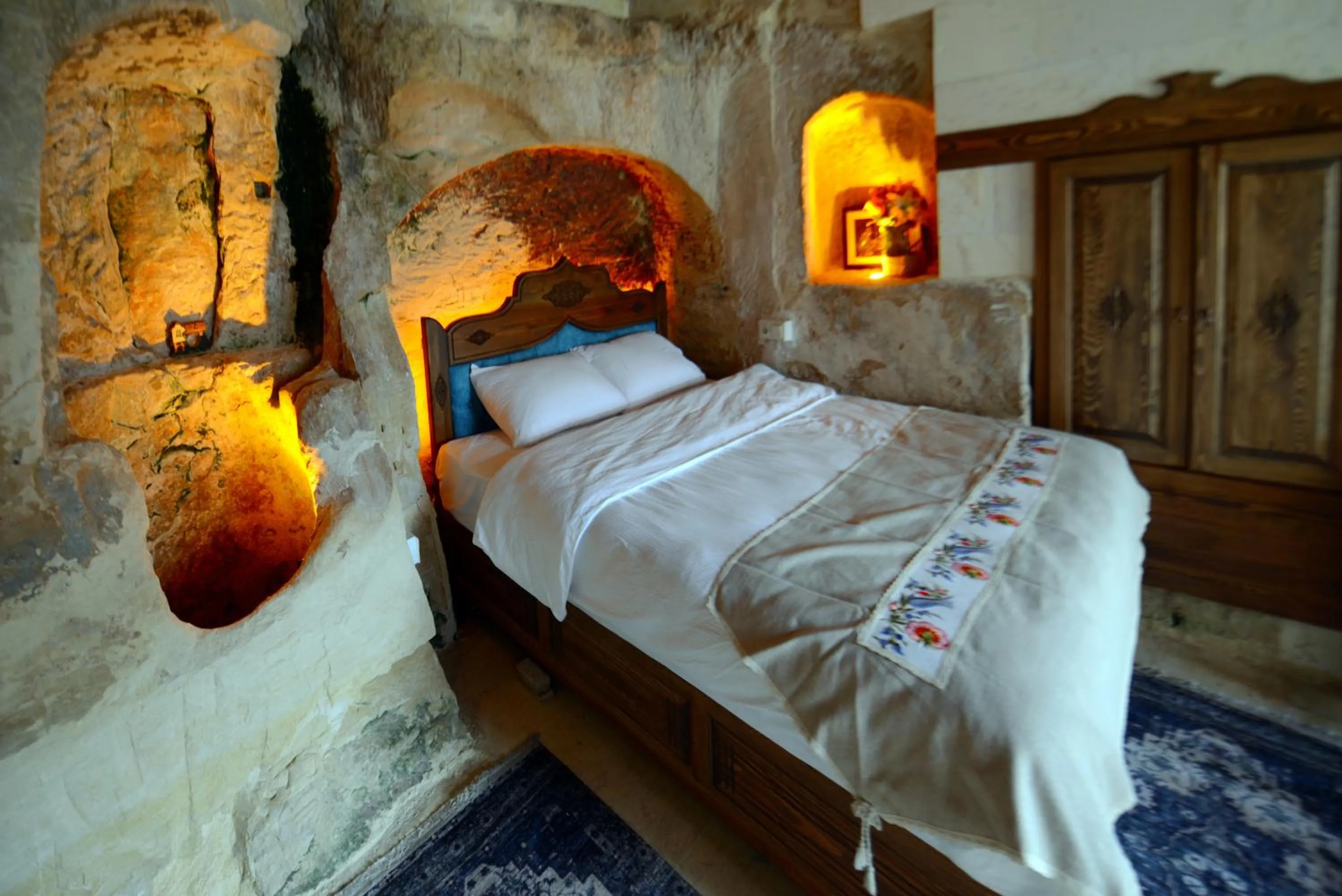 Bed in TÜRKMEN KONAGI HALFETİ BUTİK OTEL