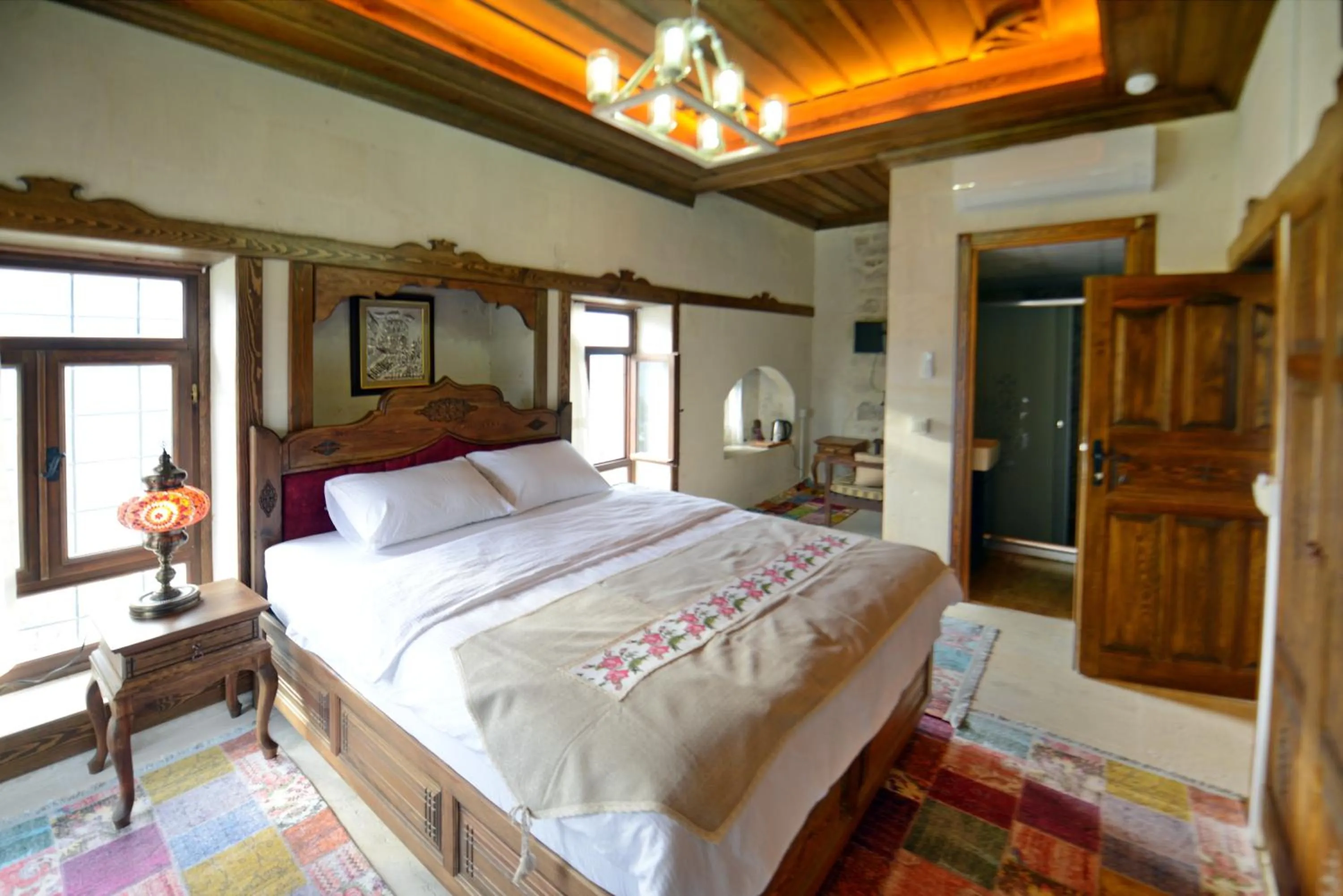Bed in TÜRKMEN KONAGI HALFETİ BUTİK OTEL