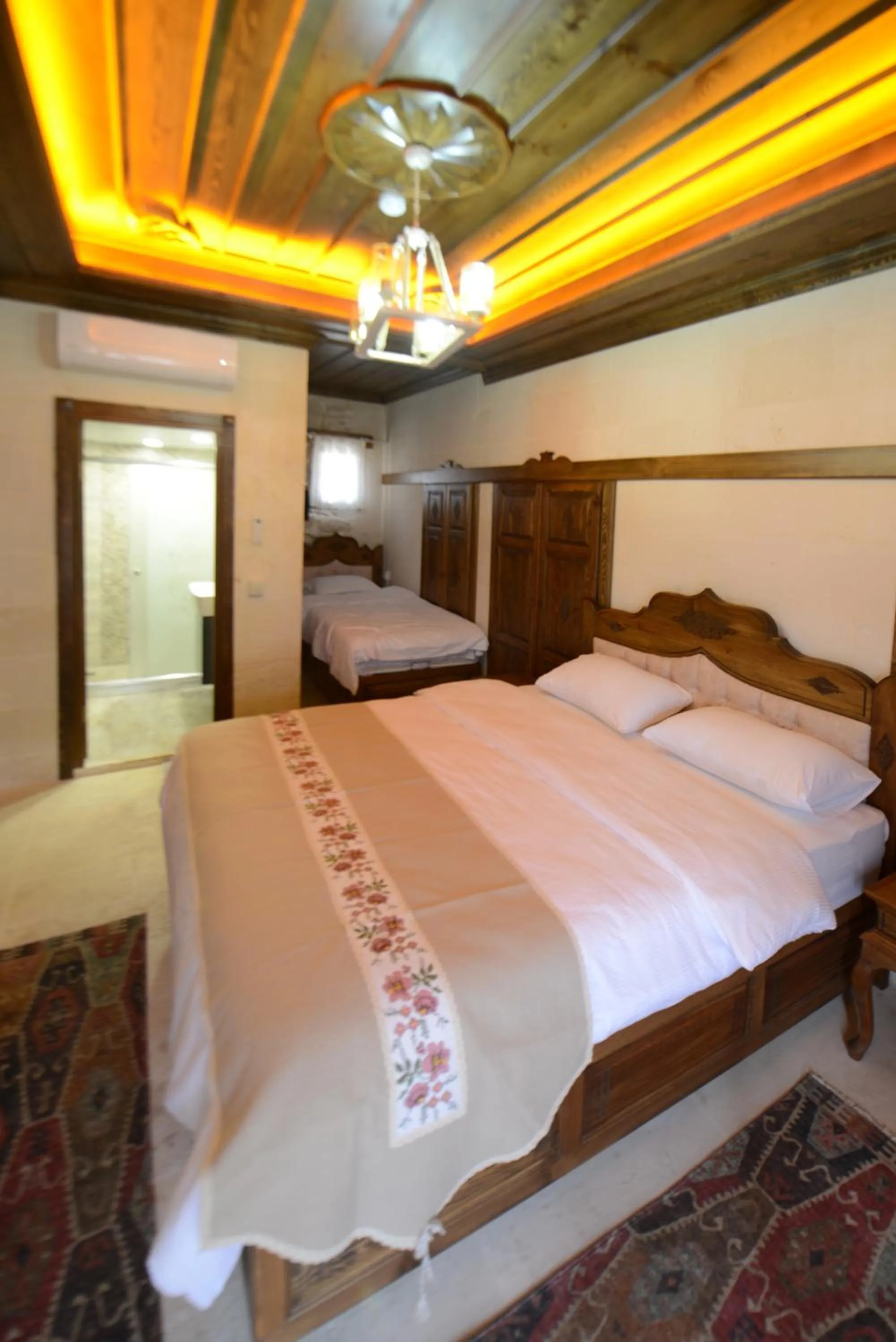 Bed in TÜRKMEN KONAGI HALFETİ BUTİK OTEL