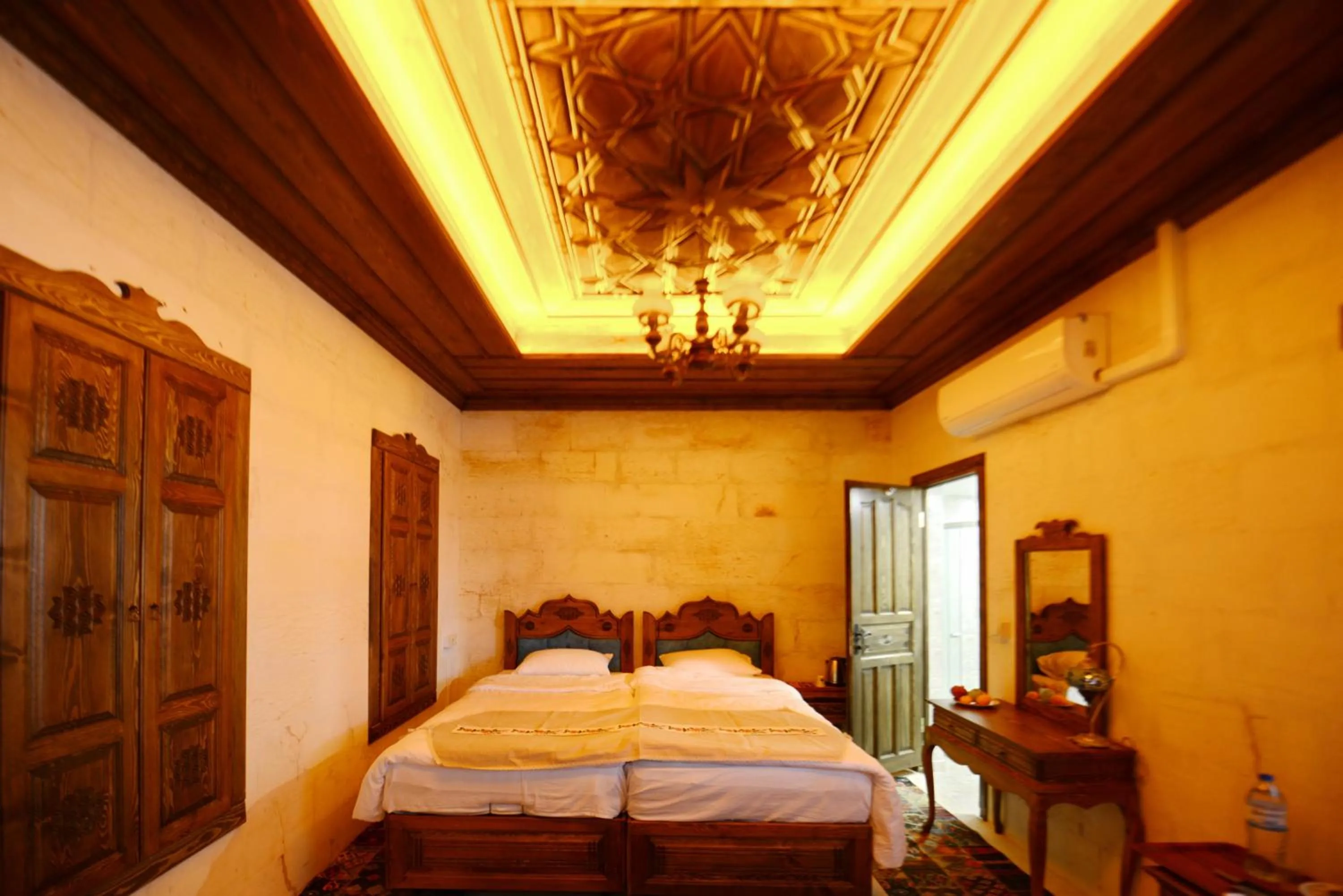 Bed in TÜRKMEN KONAGI HALFETİ BUTİK OTEL