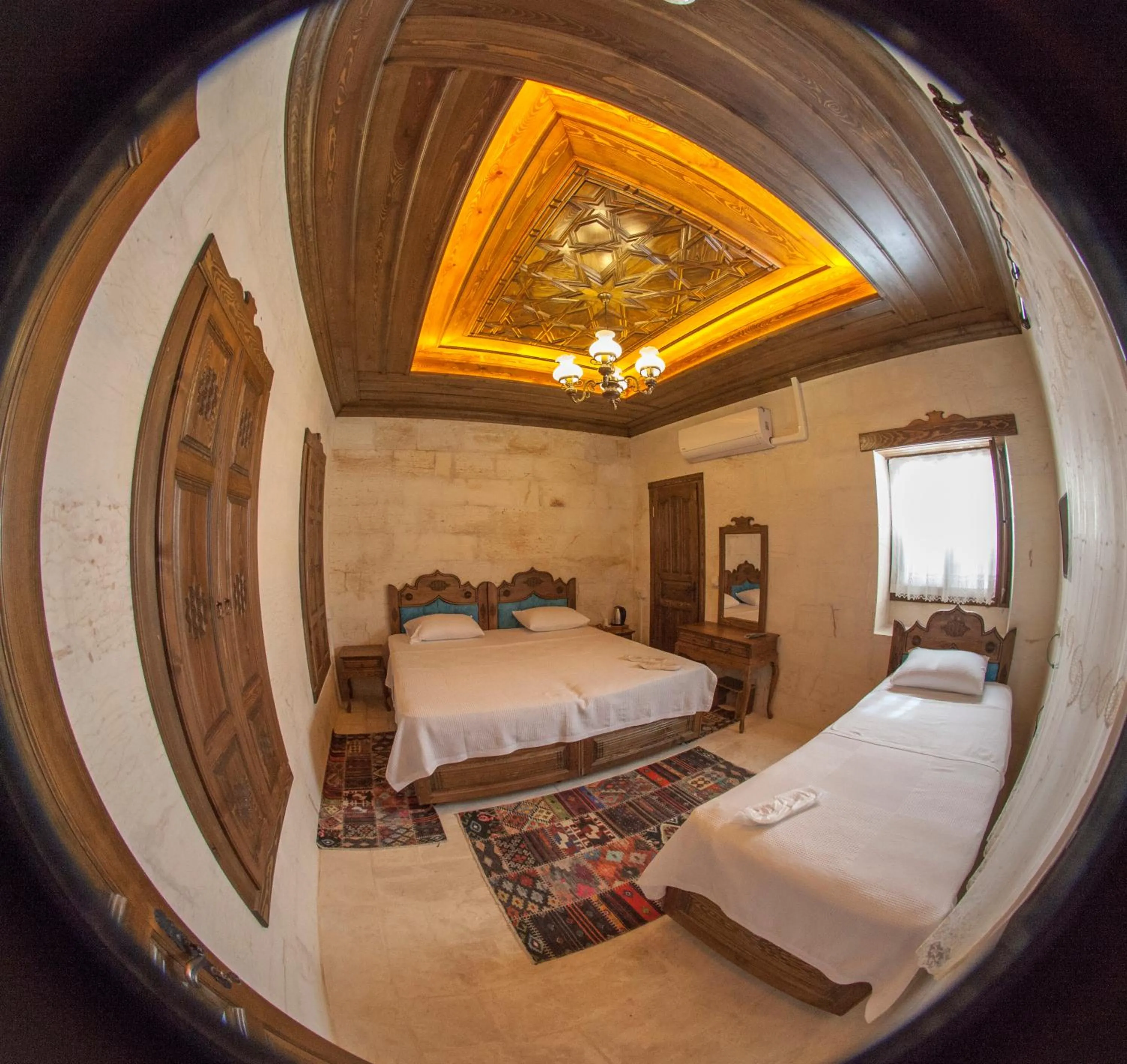 Bed in TÜRKMEN KONAGI HALFETİ BUTİK OTEL