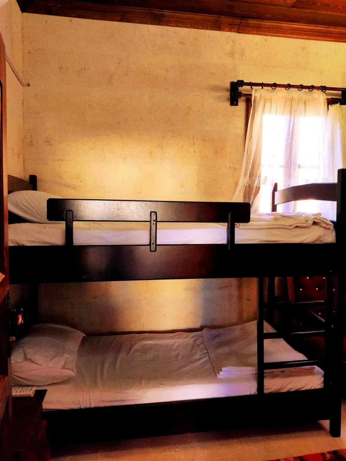 Bed in TÜRKMEN KONAGI HALFETİ BUTİK OTEL