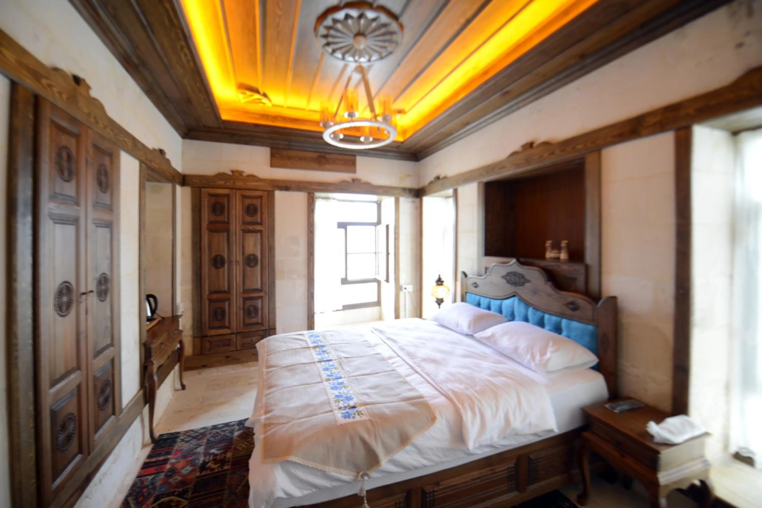 Bed in TÜRKMEN KONAGI HALFETİ BUTİK OTEL