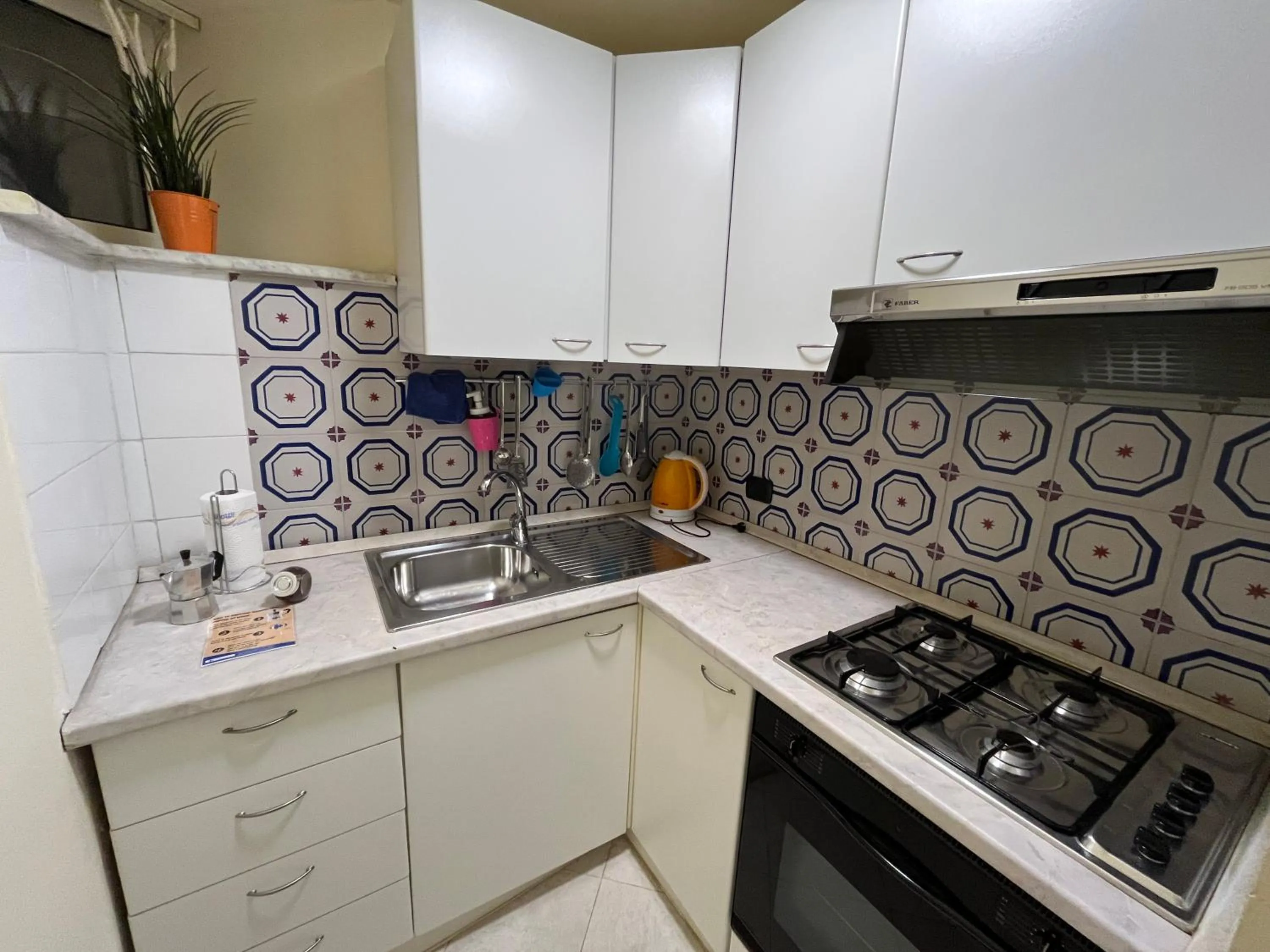 Kitchen or kitchenette in Case Così Apartments - Napoli