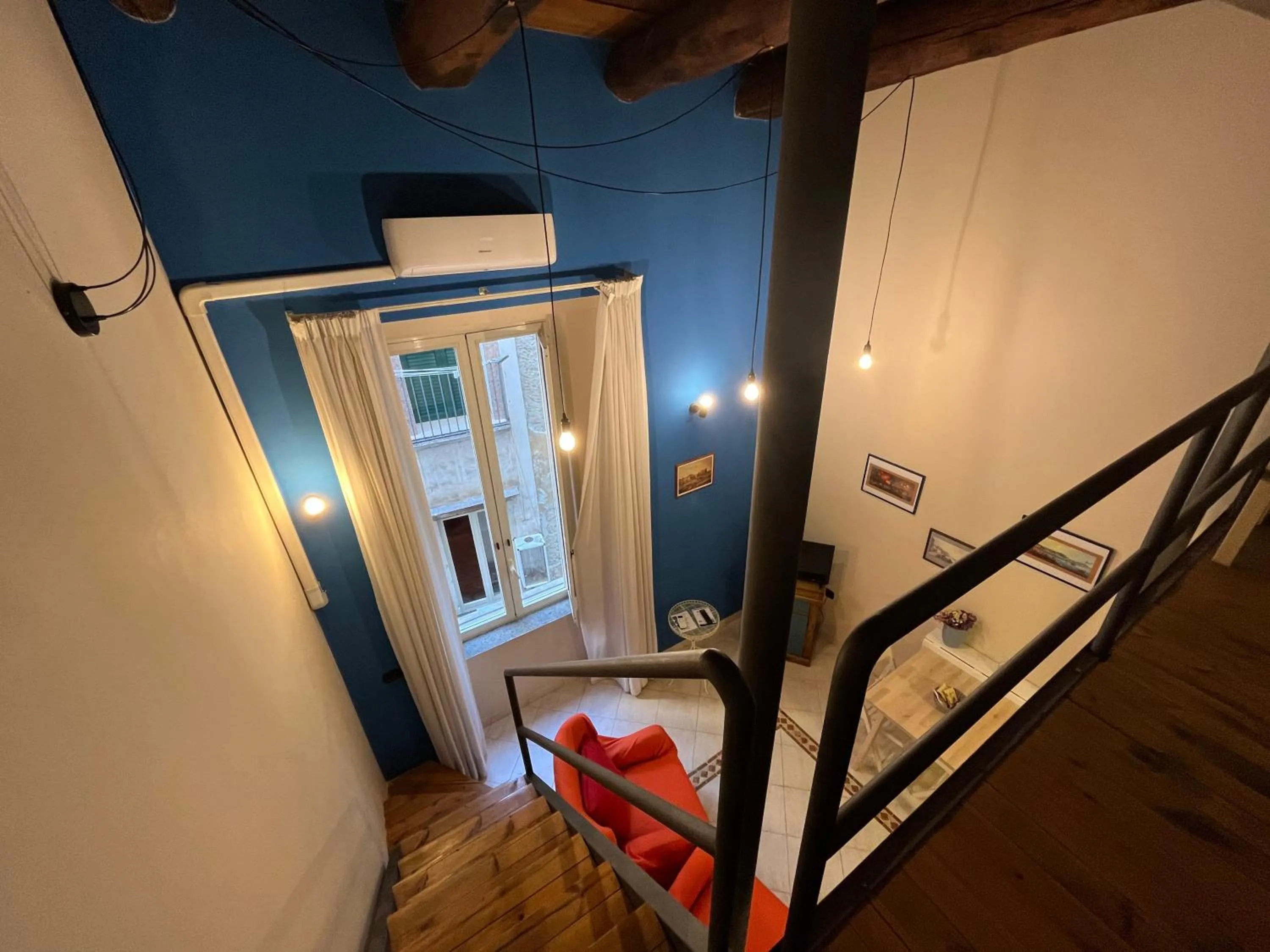 Photo of the whole room in Case Così Apartments - Napoli