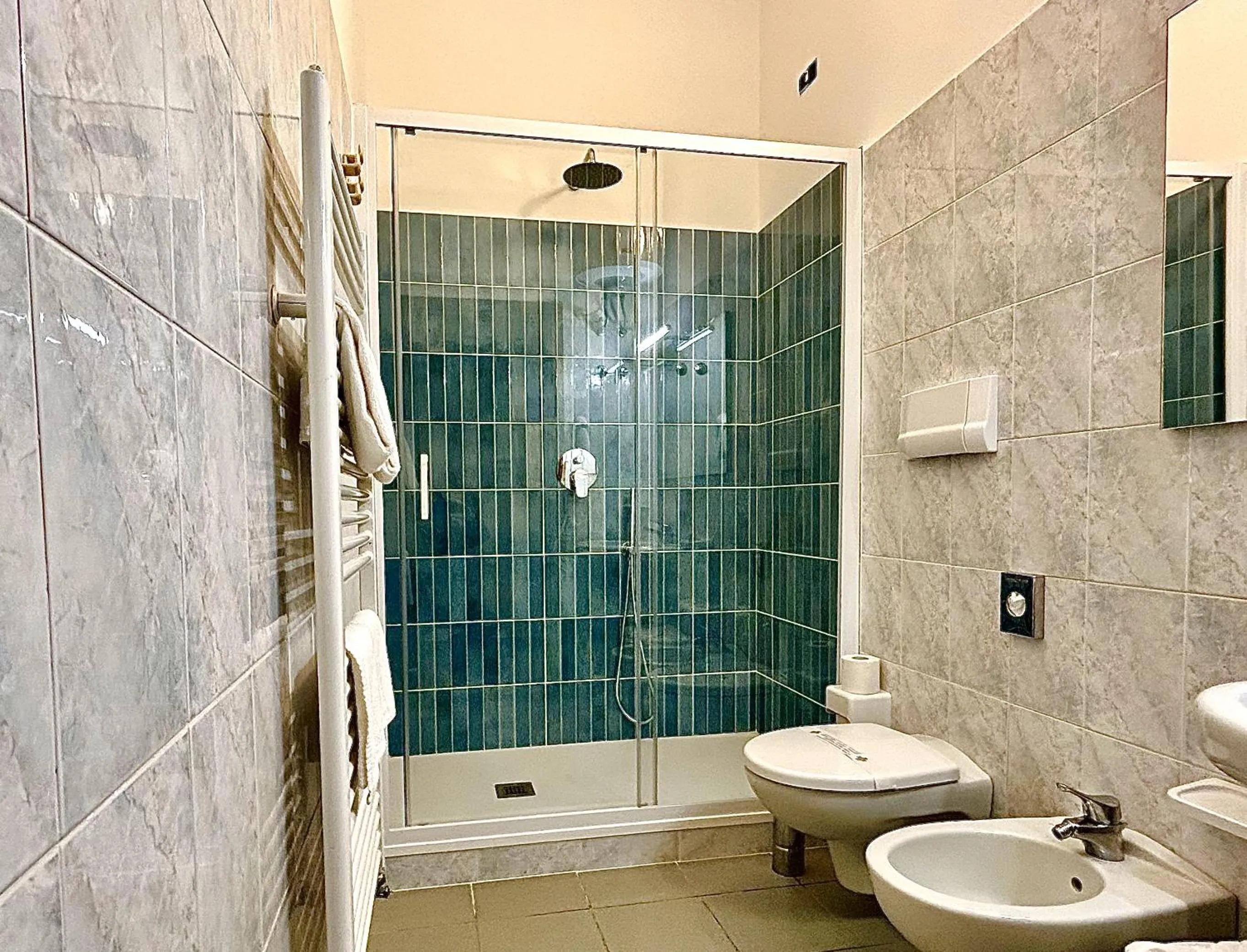 Shower in Coccodrillo Hotel & Apartments