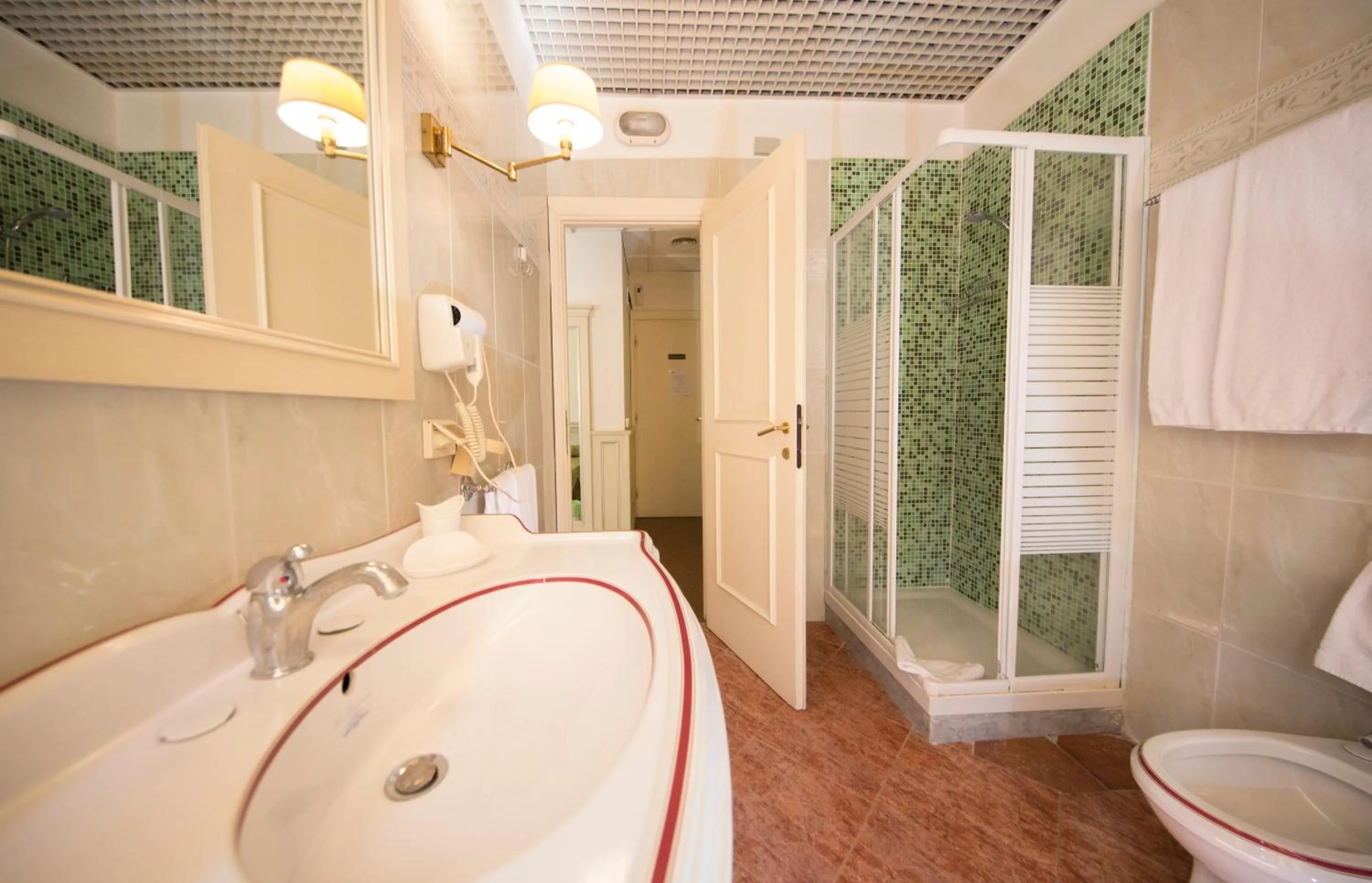 Bathroom in Mancini Park Hotel