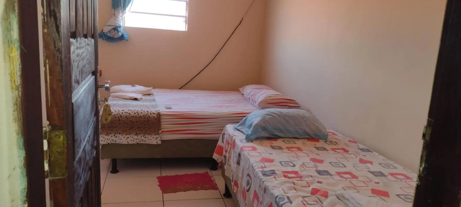 Bed in Pousada Shalom